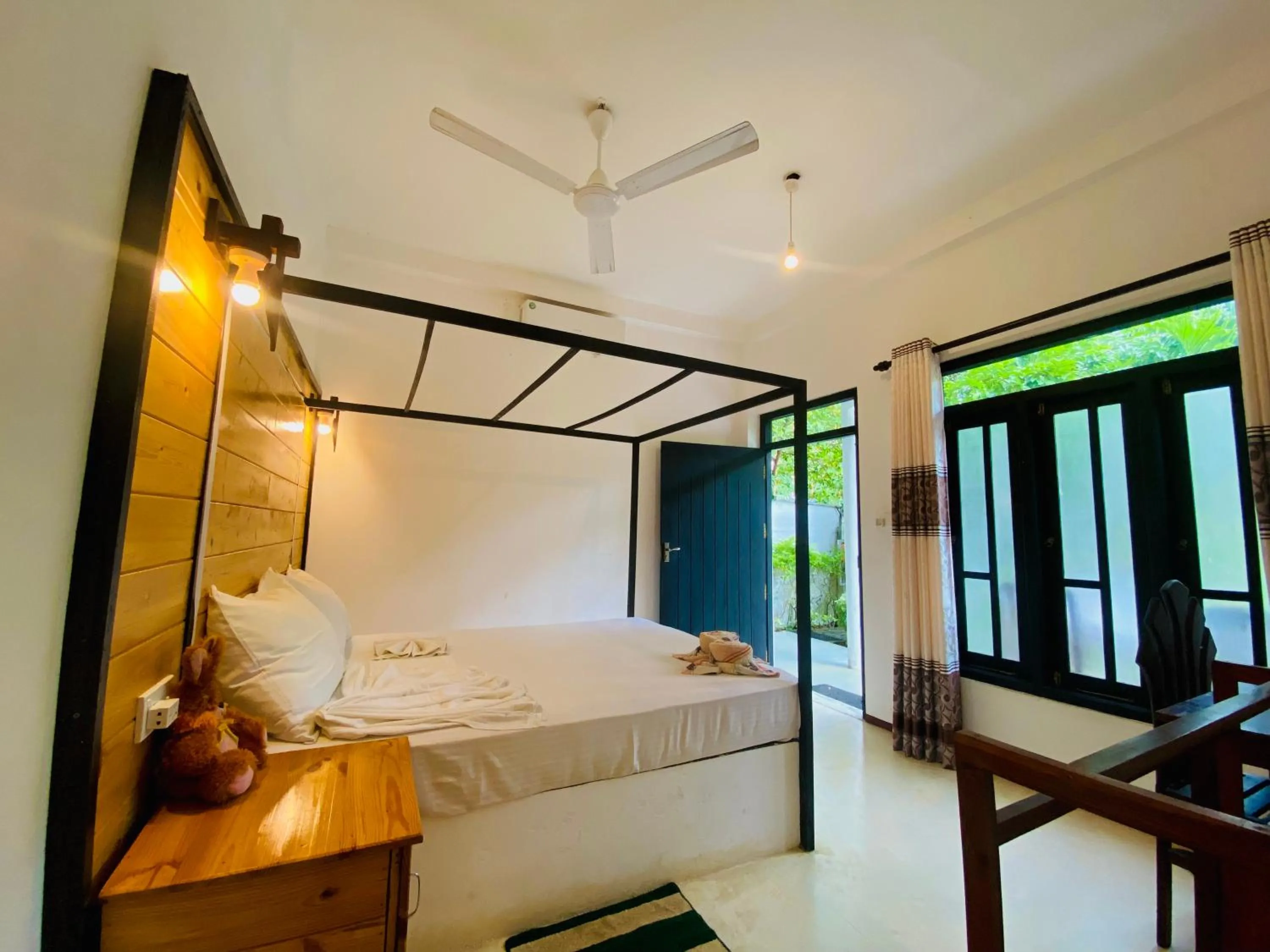 Bed in Rekawa Turtle Gate Hotel