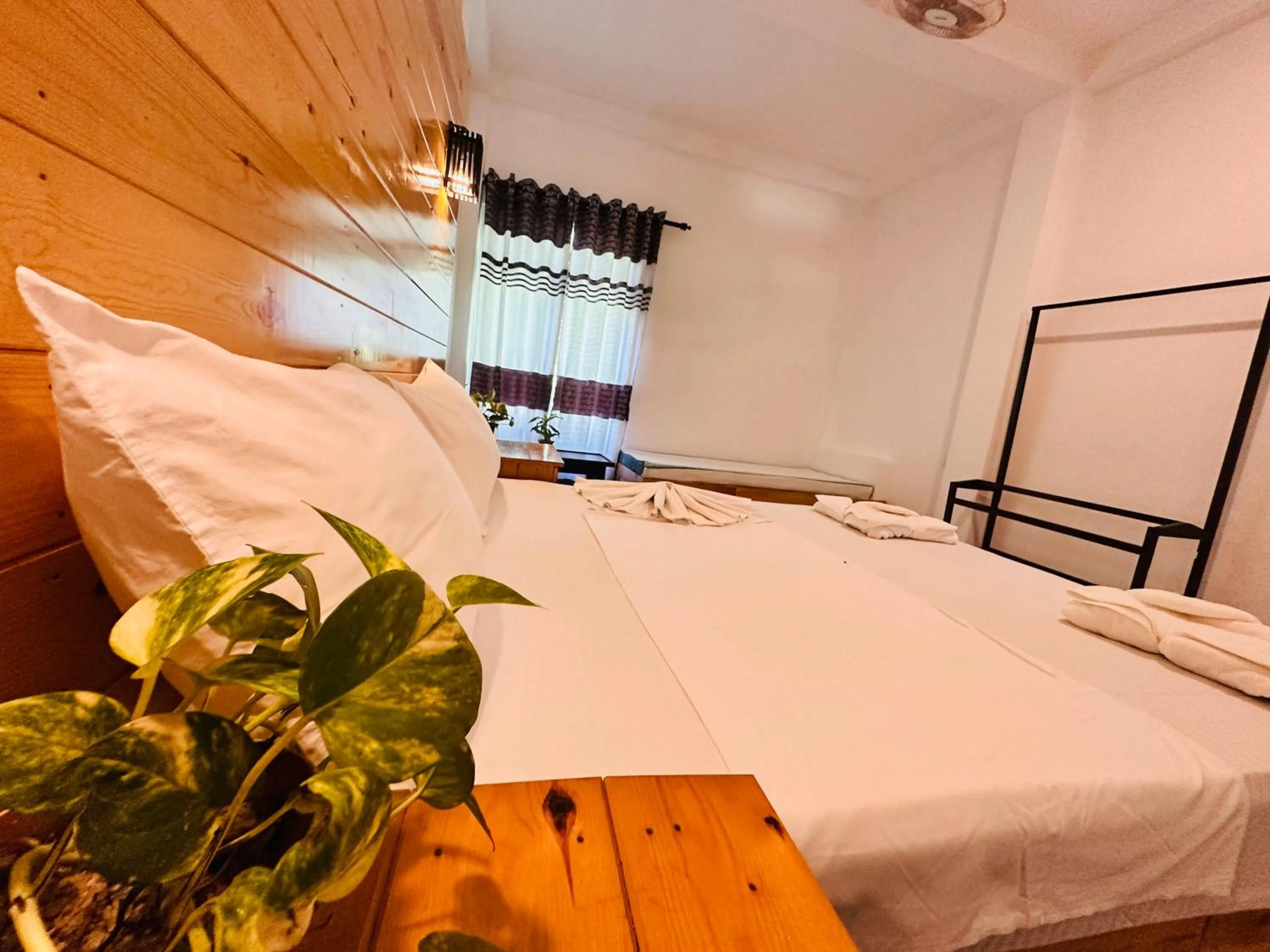 Bed in Rekawa Turtle Gate Hotel