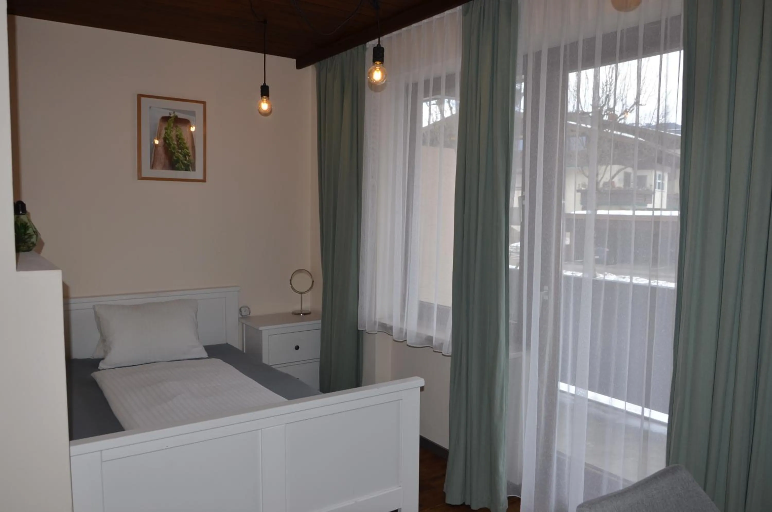 Bed in Dahoam by Sarina - Rooms & Suites