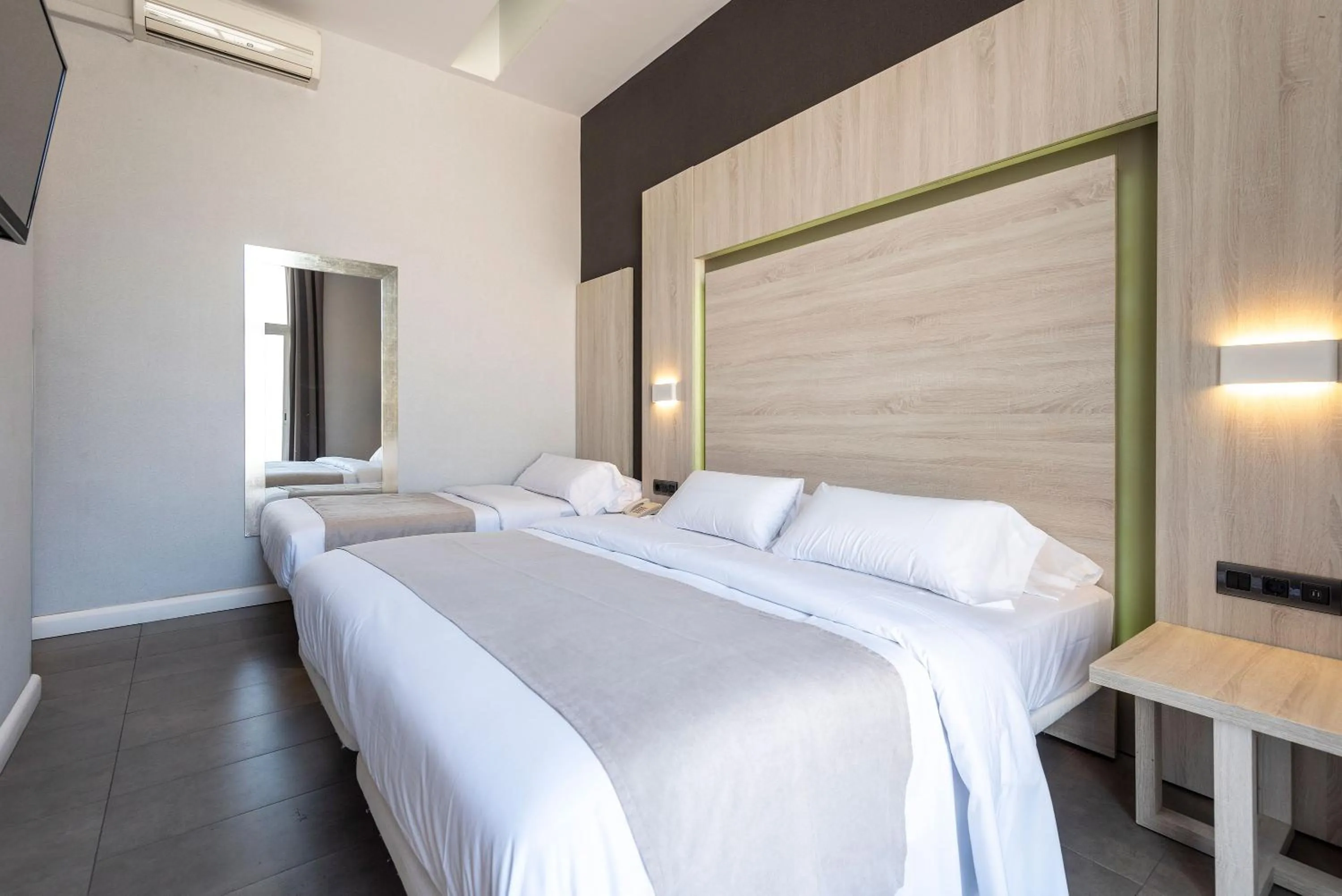 Decorative detail, Bed in Plaza Goya Rooms