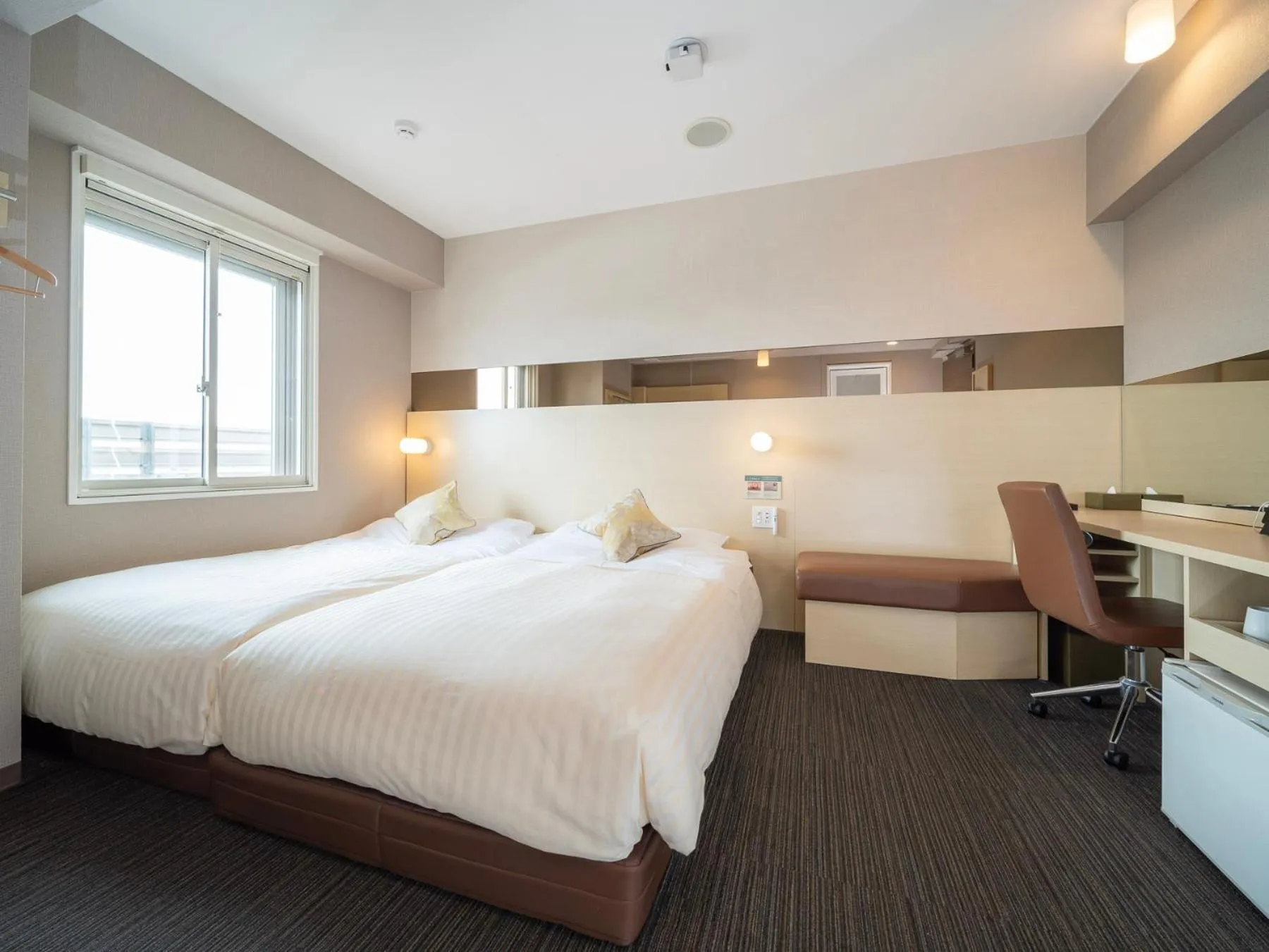 Bed in Super Hotel Premier Musashi Kosugi Ekimae