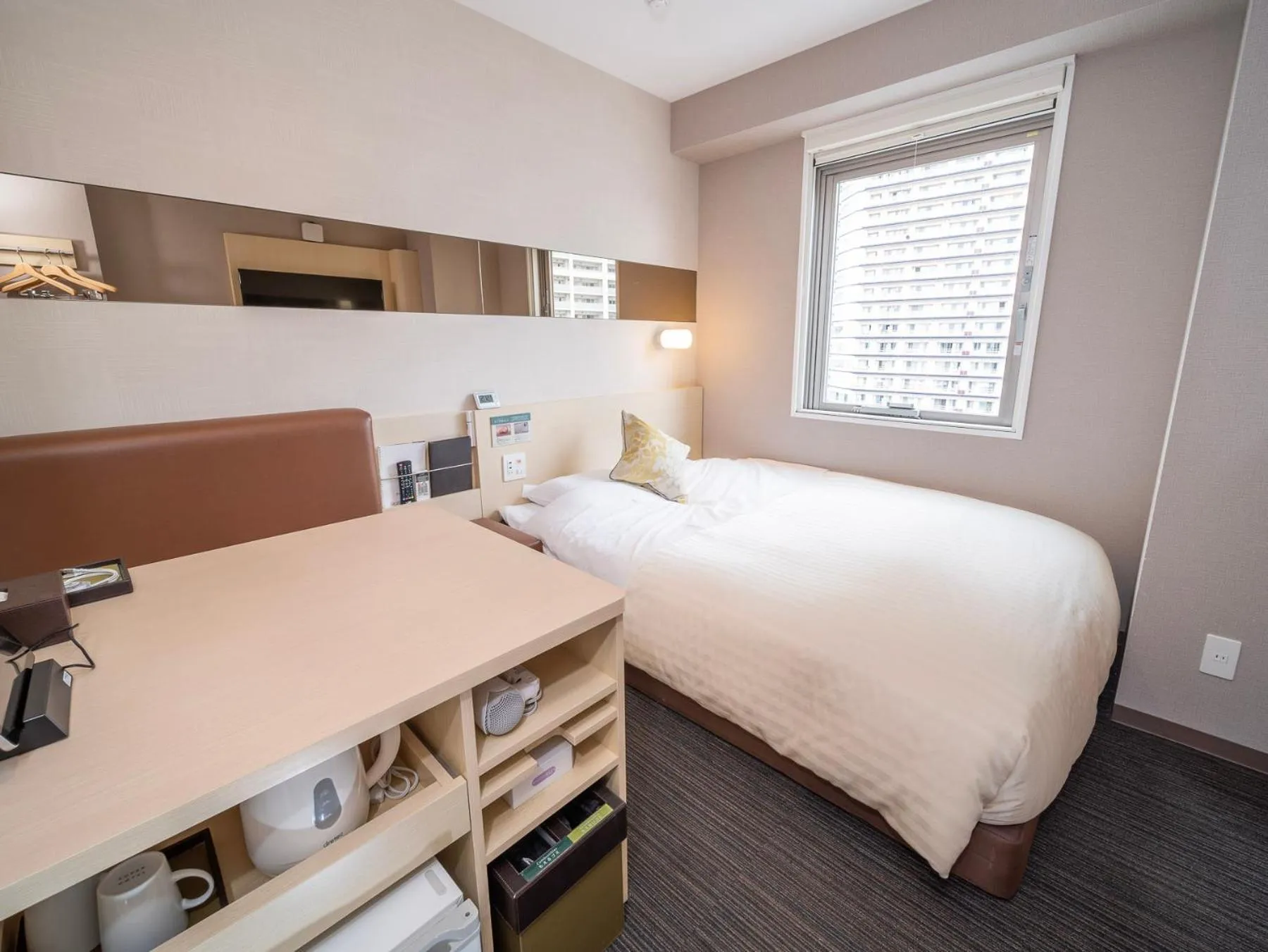 Bed in Super Hotel Premier Musashi Kosugi Ekimae