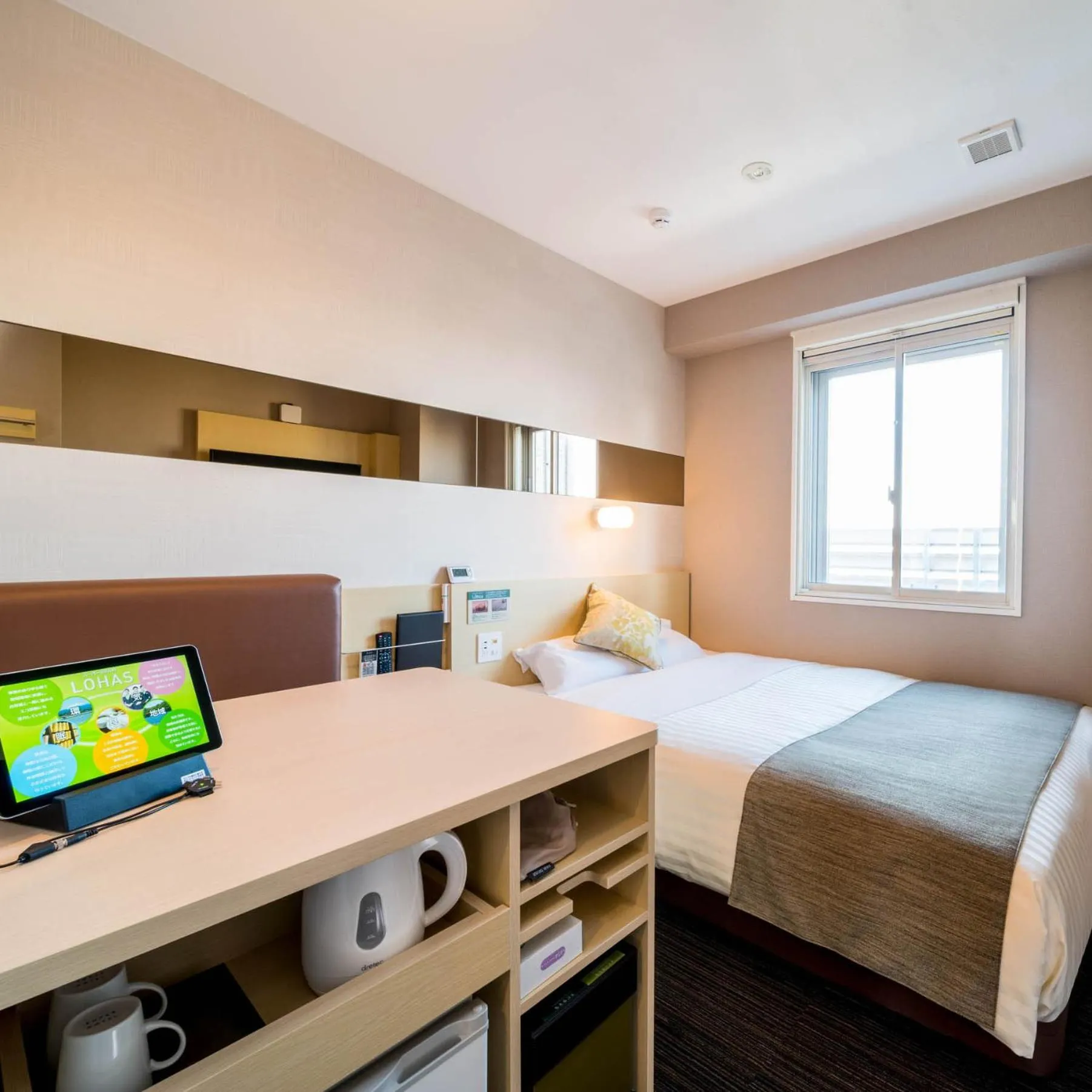 Bed in Super Hotel Premier Musashi Kosugi Ekimae