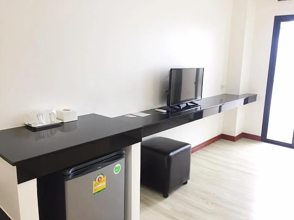 Communal lounge/ TV room in Orchid Riverview Hotel