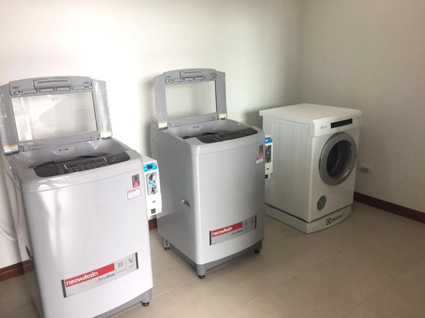 washing machine in Orchid Riverview Hotel