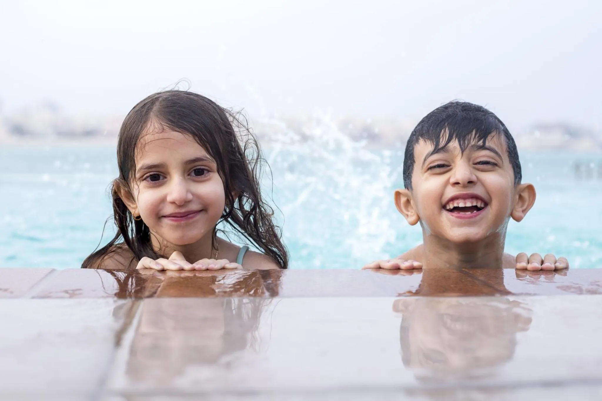 Family in The Grove Resort Bahrain