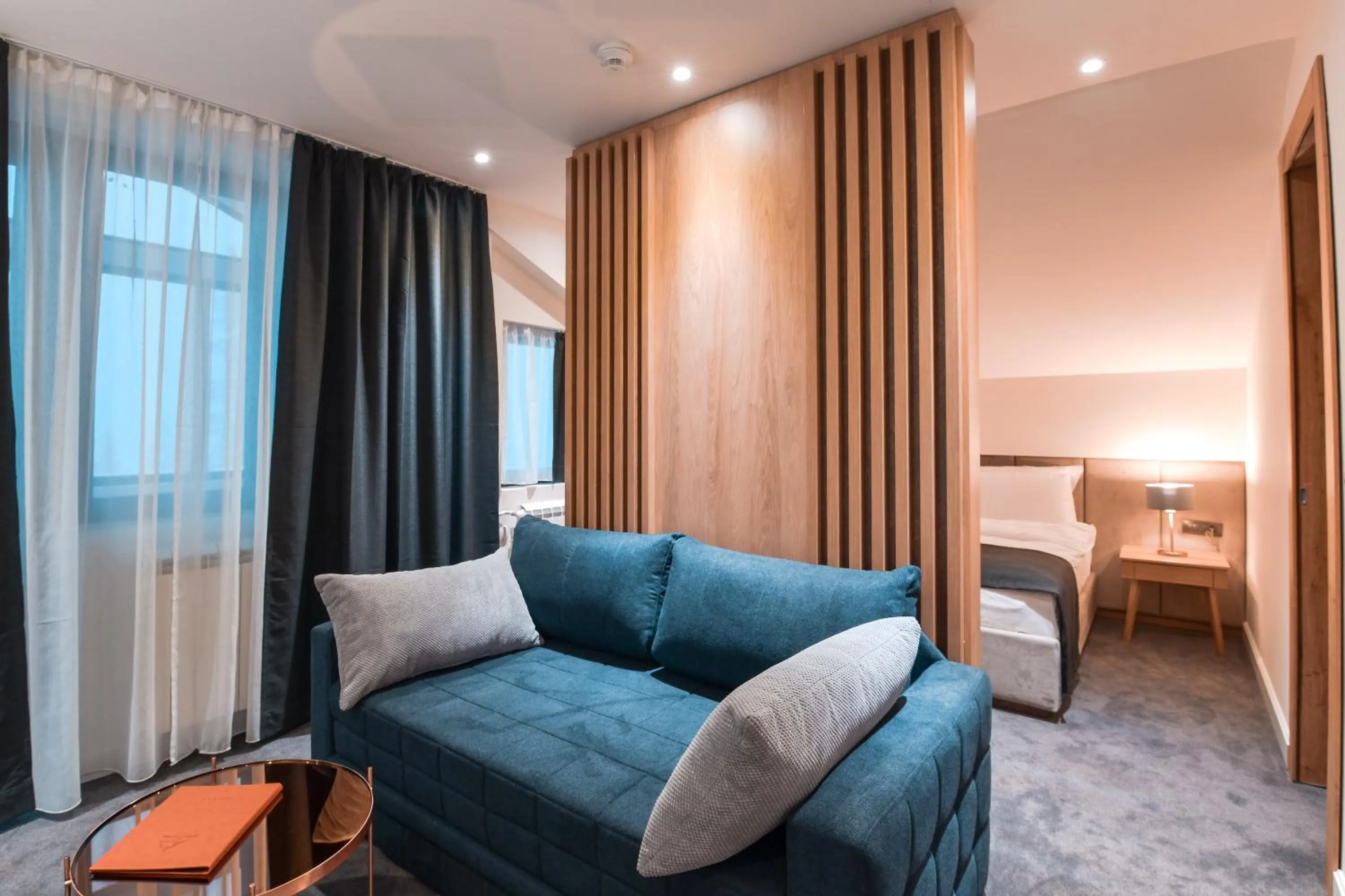 Seating area, Bed in Hotel Putnik Kopaonik