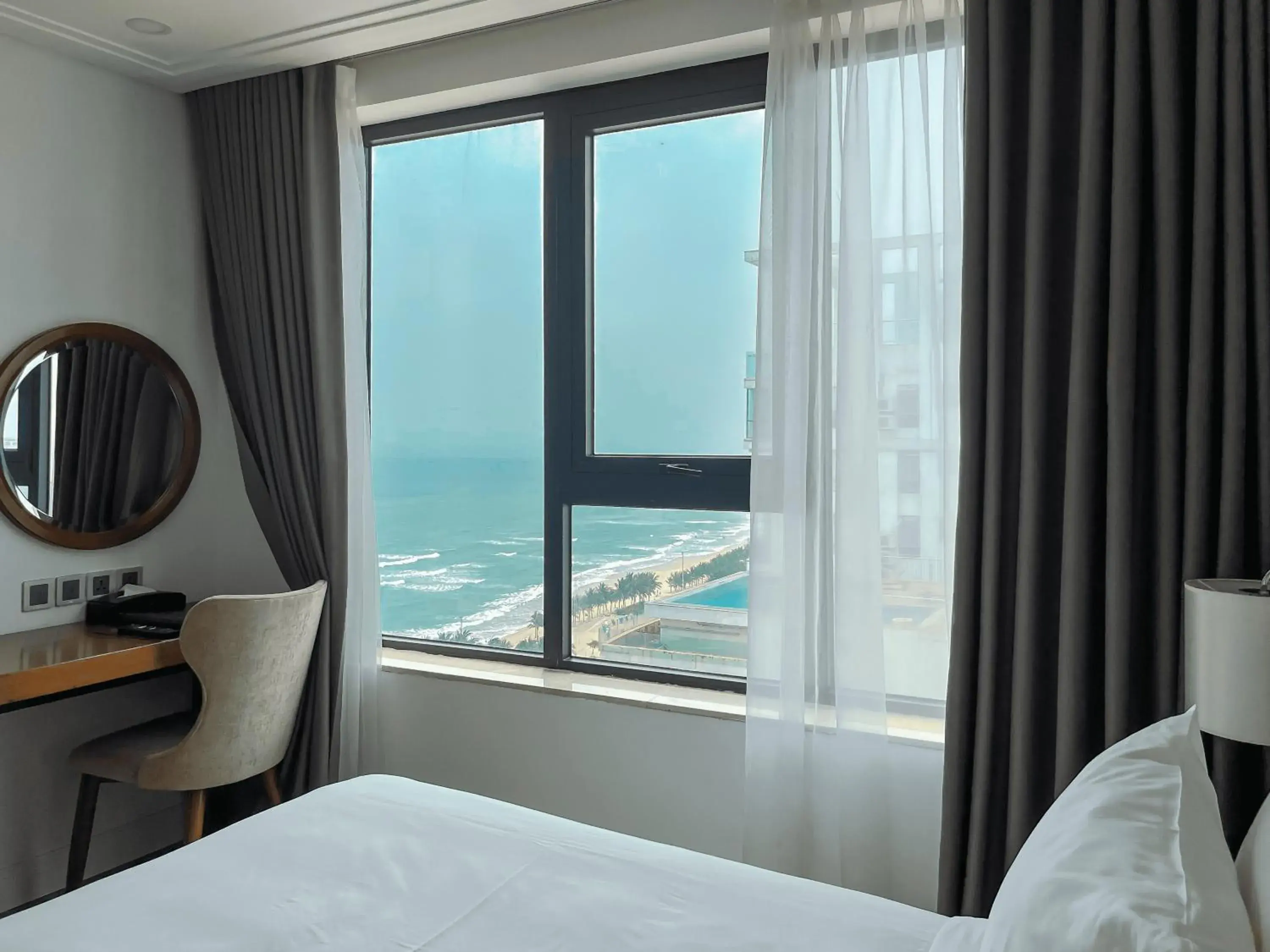 Deluxe King Room with Partial Sea View - High floor in Paris Deli Danang Beach Hotel Deluxe King Room with Partial Sea View - High floor in Paris Deli Danang Beach Hotel