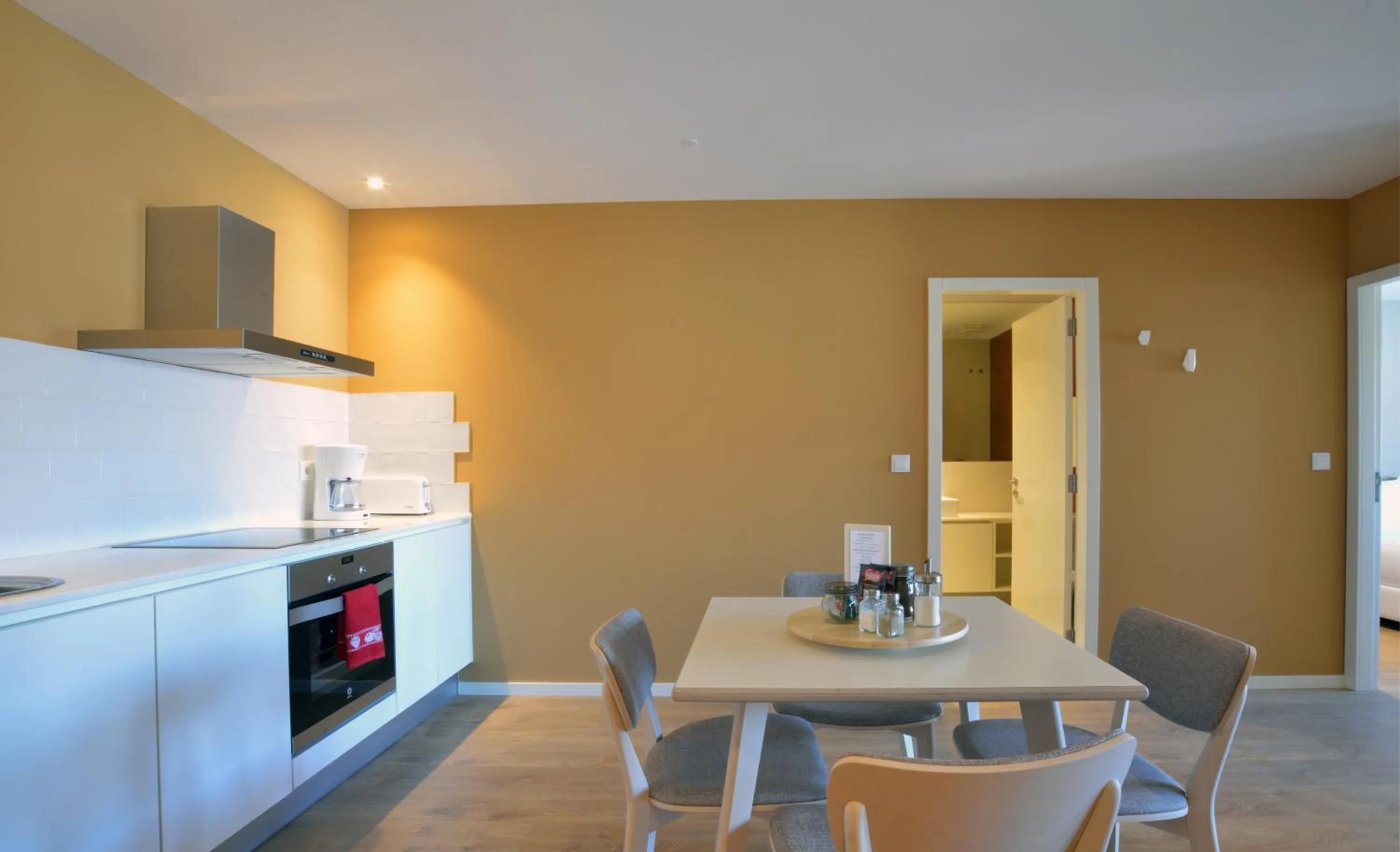 Kitchen or kitchenette in Spot Family Apartments