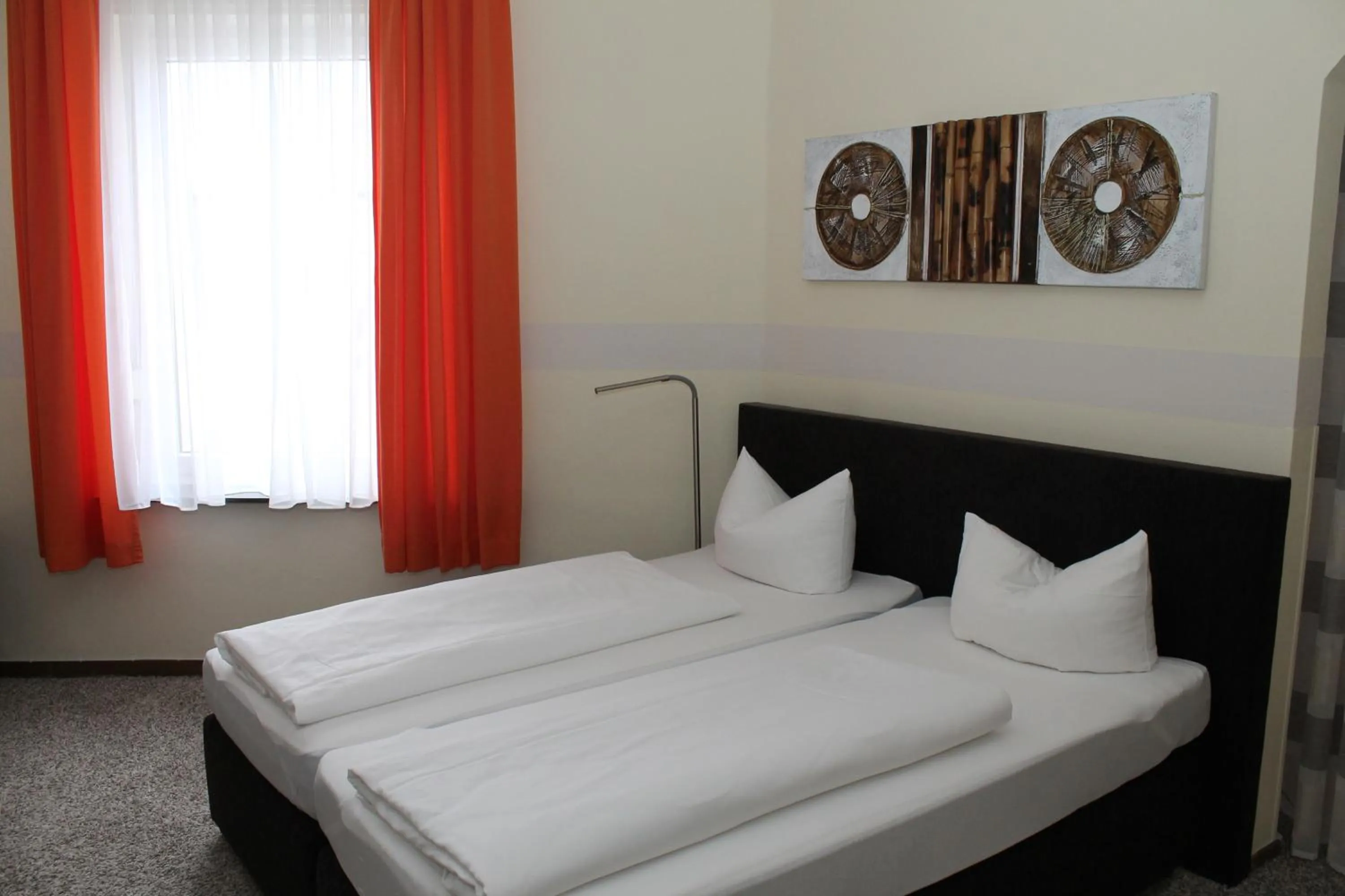 Bed in Hotel Rheinischer Hof