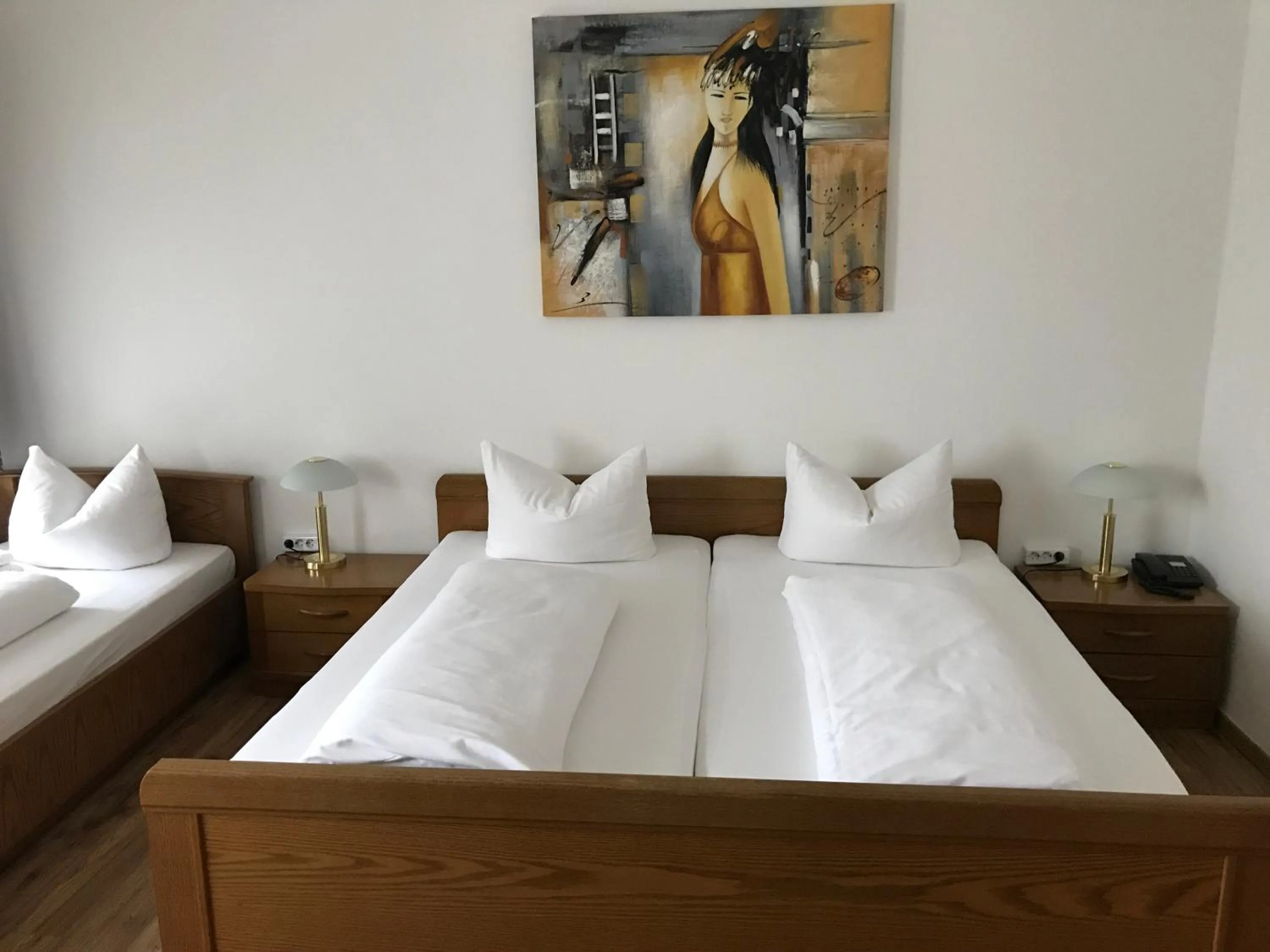 Bed in Hotel Rheinischer Hof