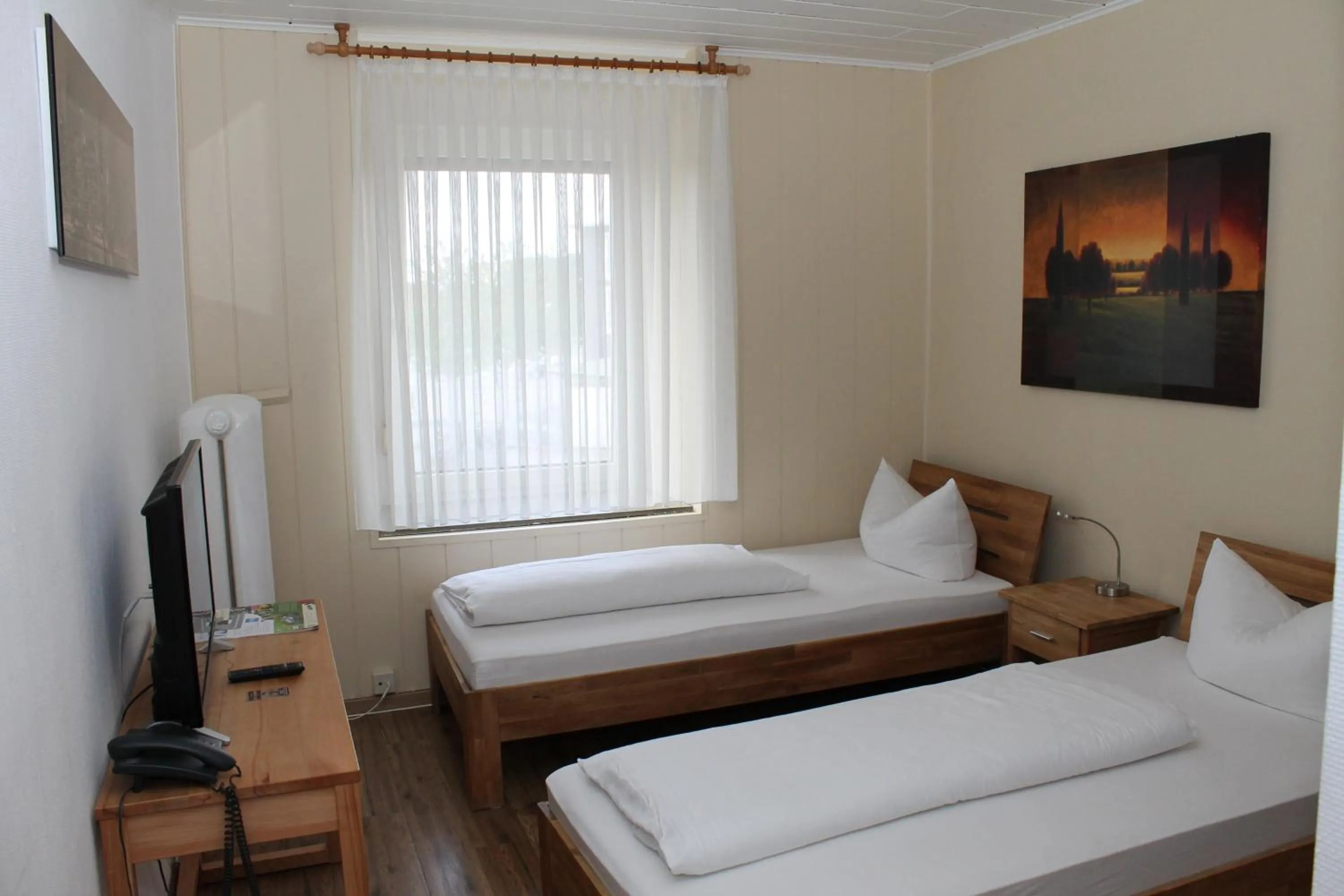 Bed in Hotel Rheinischer Hof