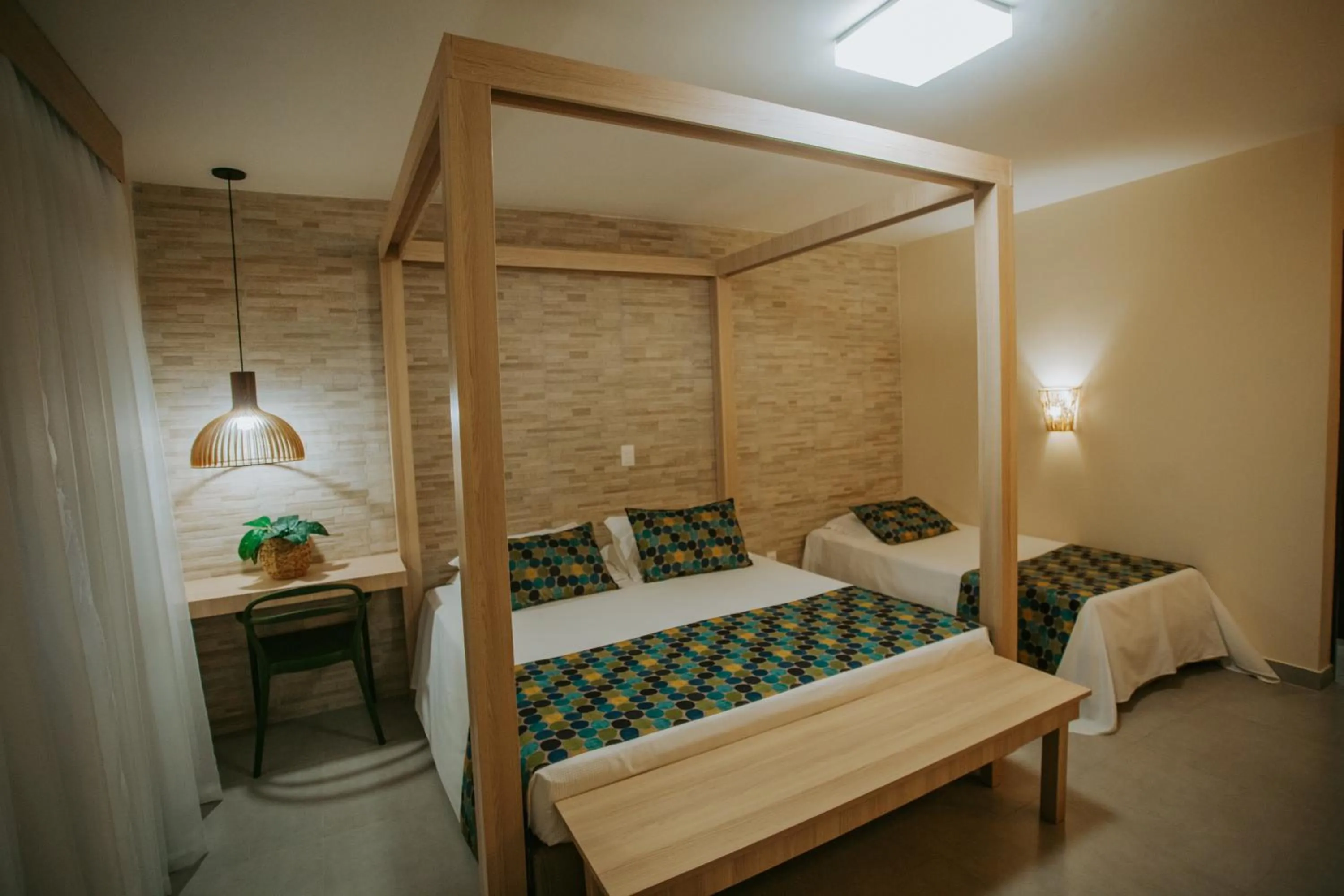 Photo of the whole room, Bed in Pousada Tabapitanga