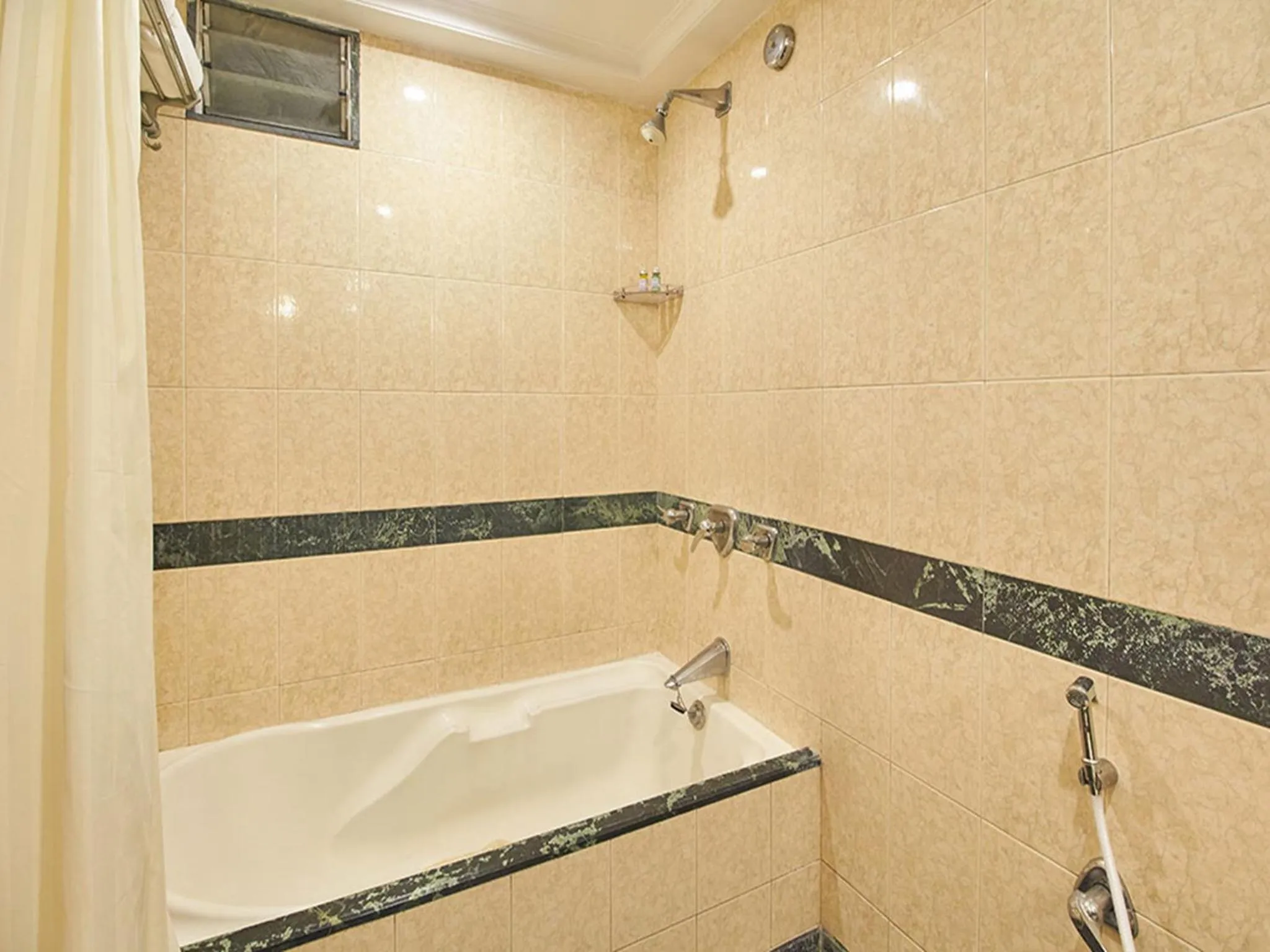 Bathroom in Sarovar Portico Rivera Ahmedabad