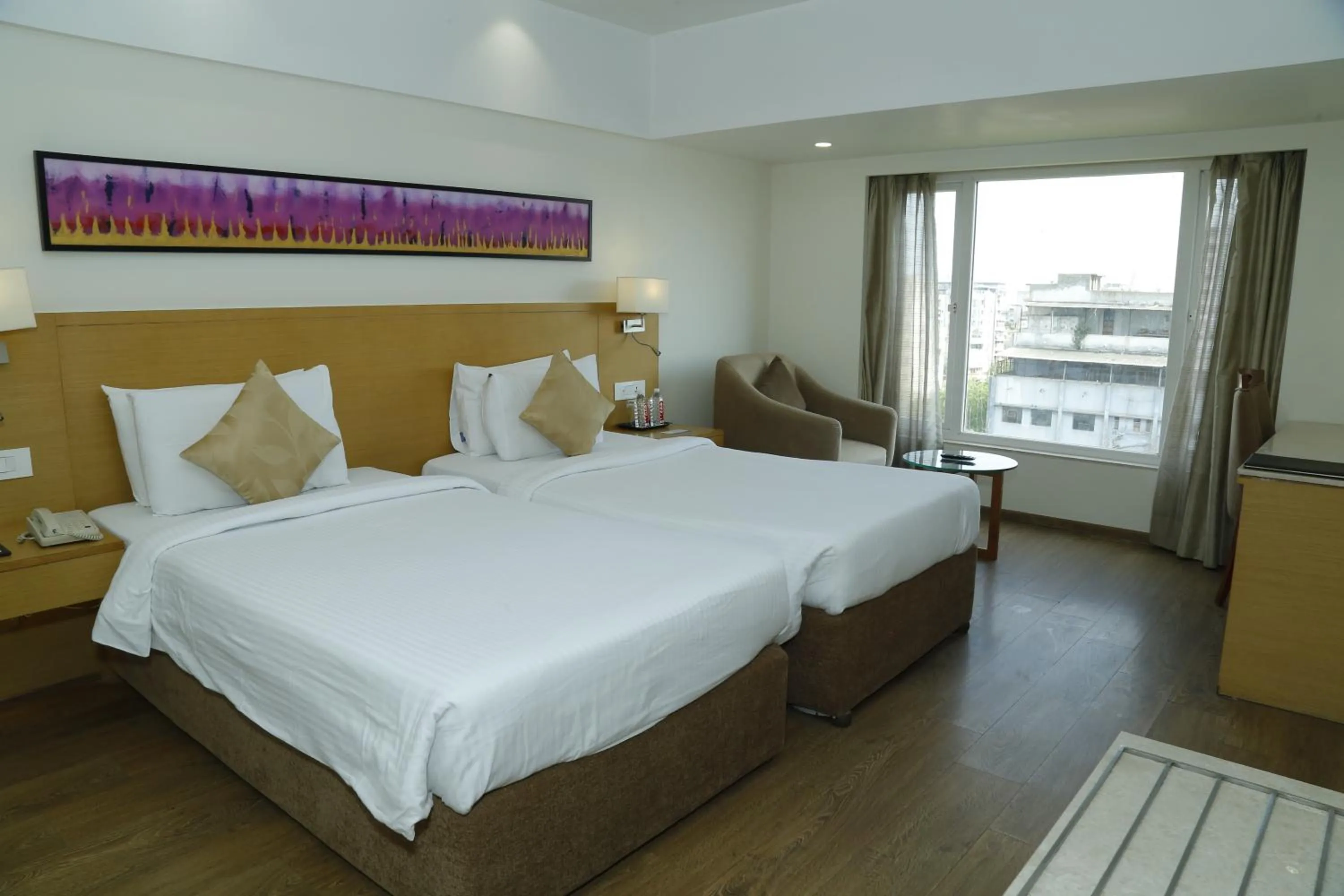 Photo of the whole room, Bed in Sarovar Portico Rivera Ahmedabad