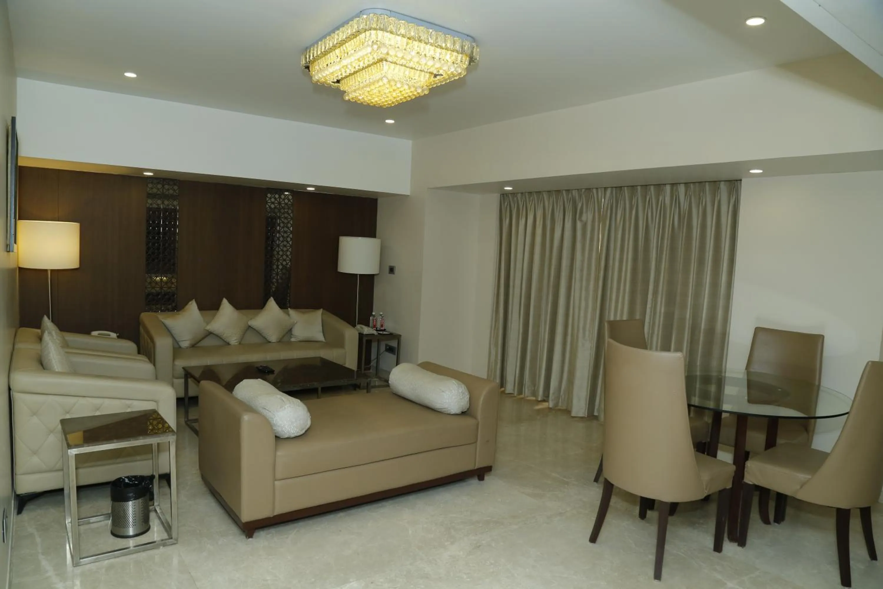 Living room in Sarovar Portico Rivera Ahmedabad