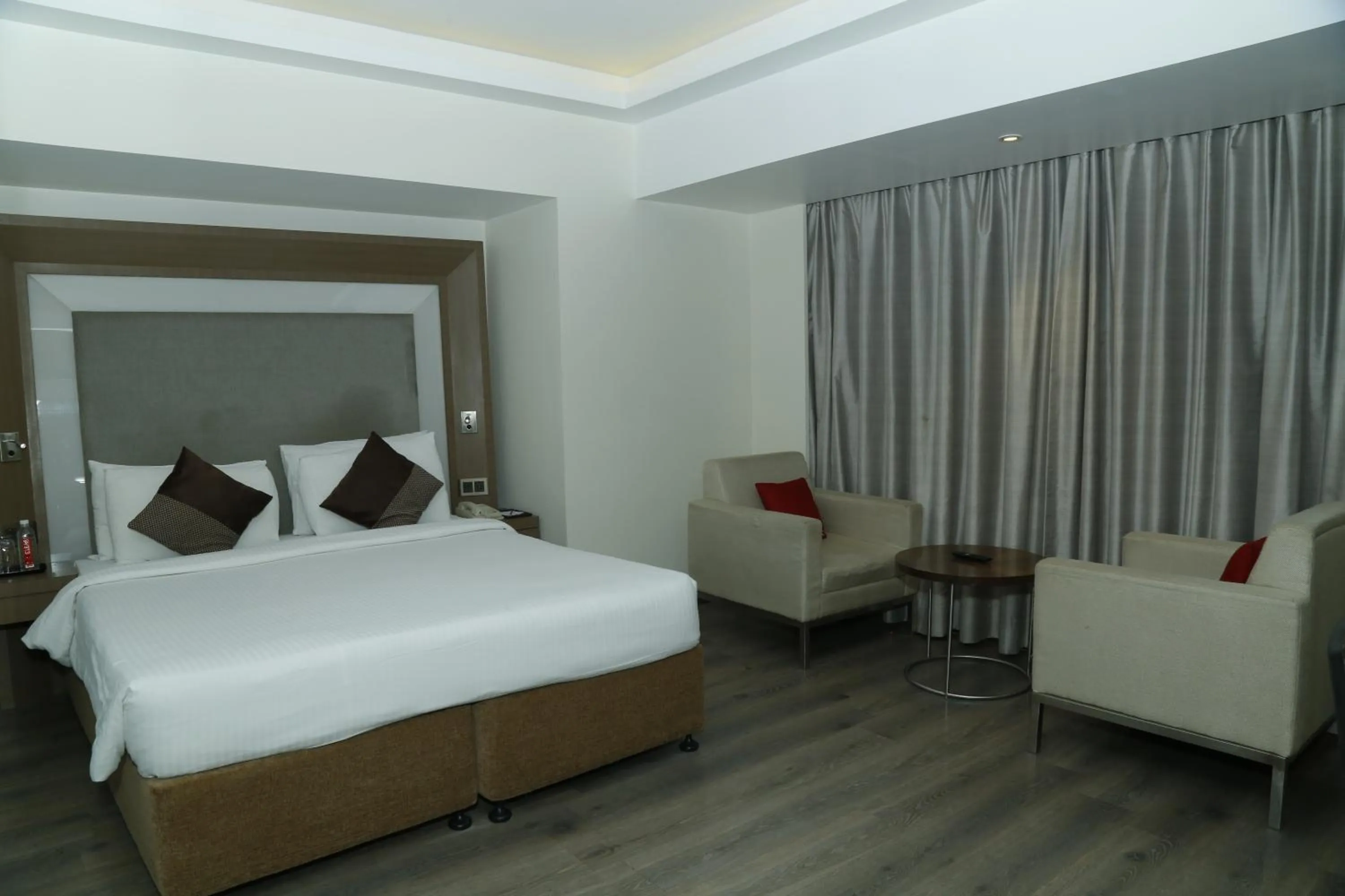 Bed in Sarovar Portico Rivera Ahmedabad