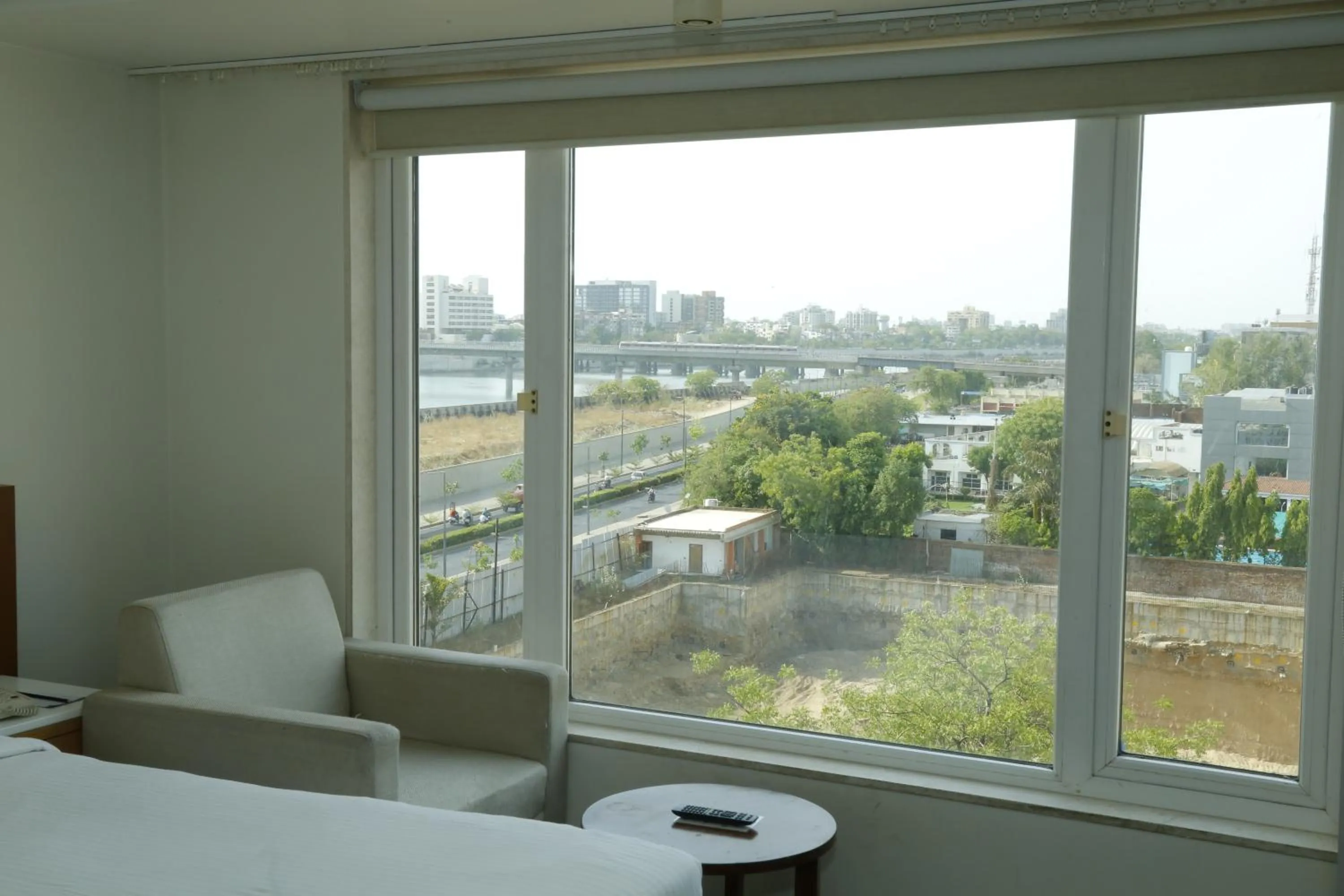 View (from property/room), Bed in Sarovar Portico Rivera Ahmedabad