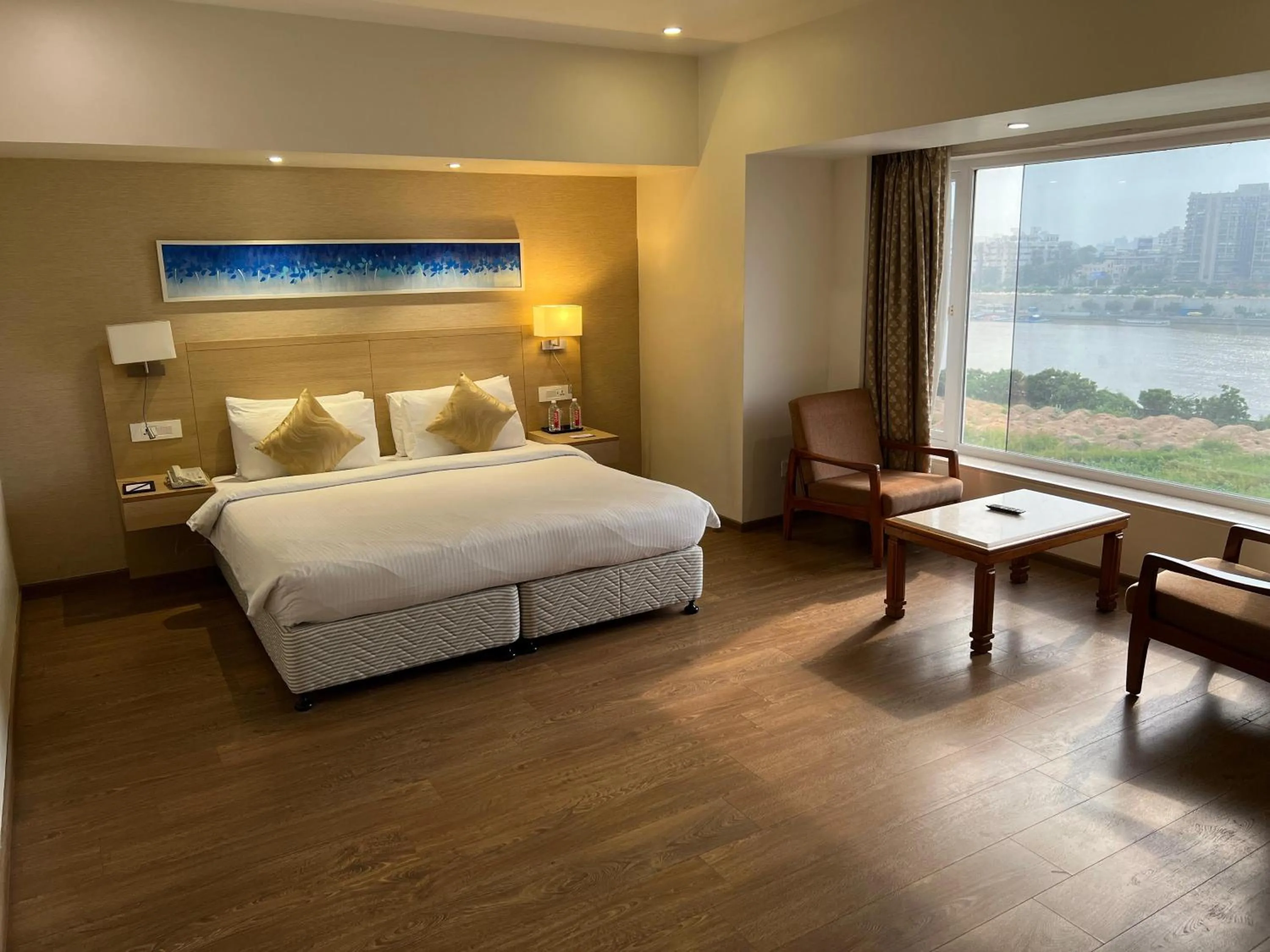 Property building, Bed in Sarovar Portico Rivera Ahmedabad