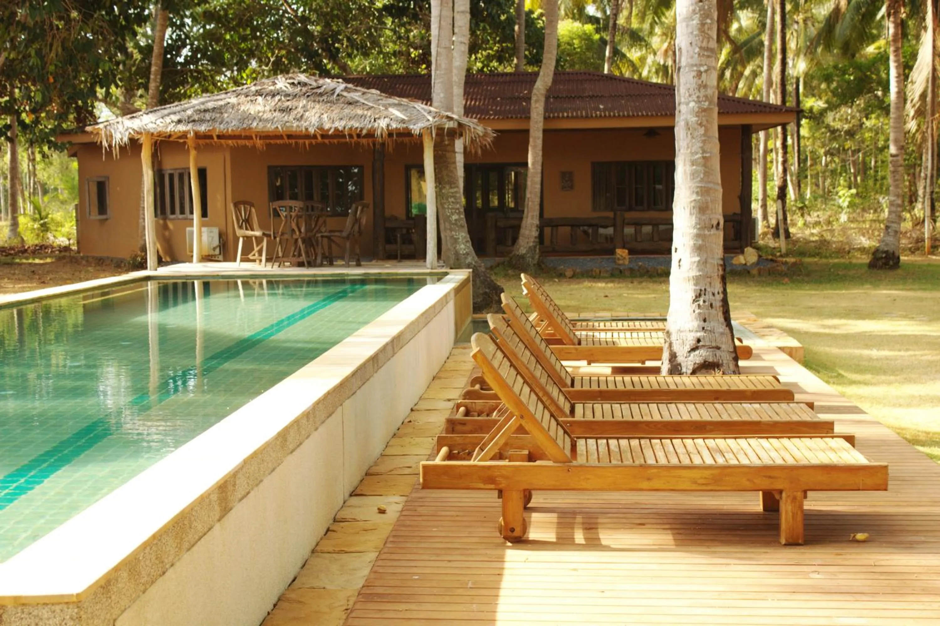 Photo of the whole room in Melina Beach Front Bungalows