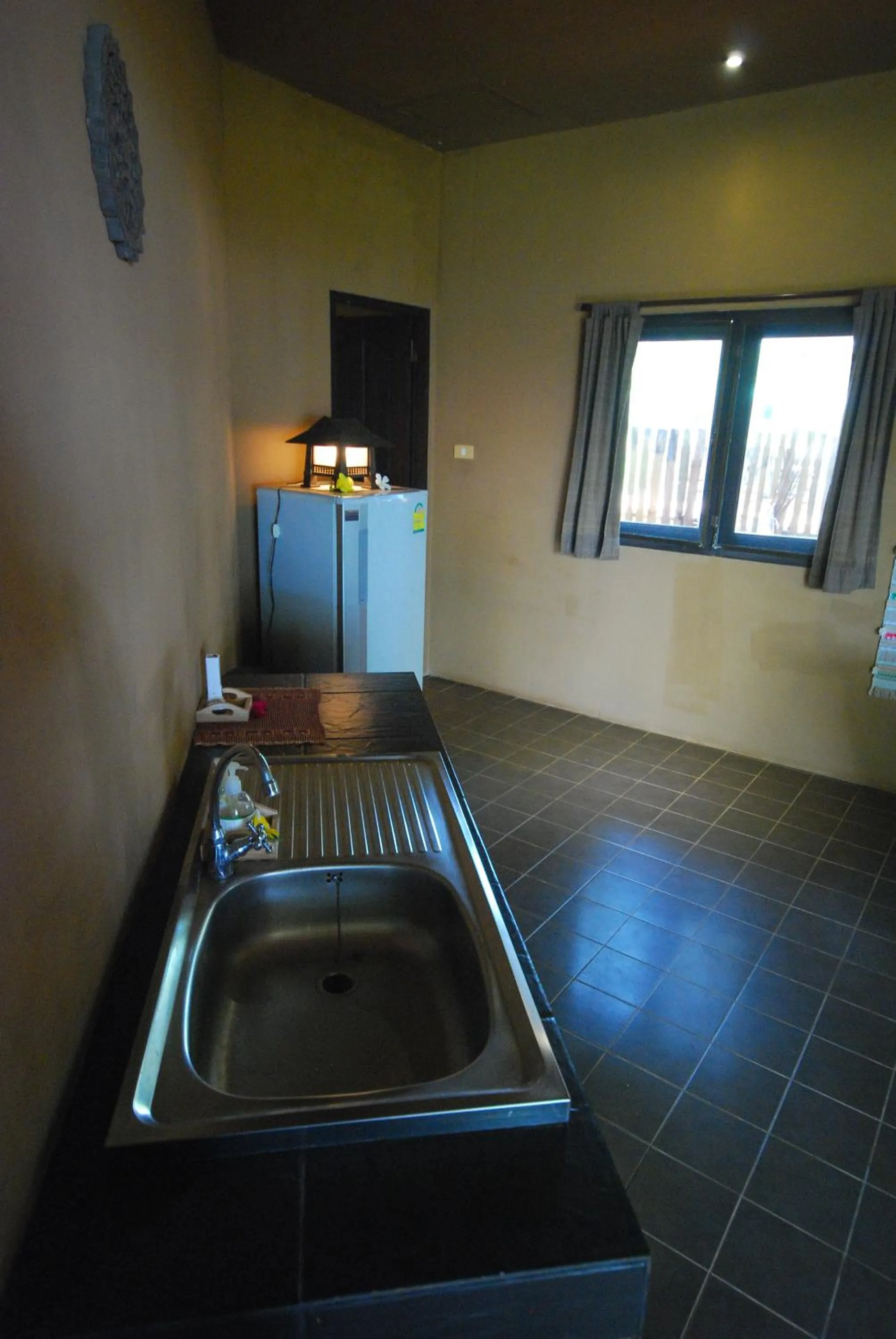 Kitchen or kitchenette in Melina Beach Front Bungalows