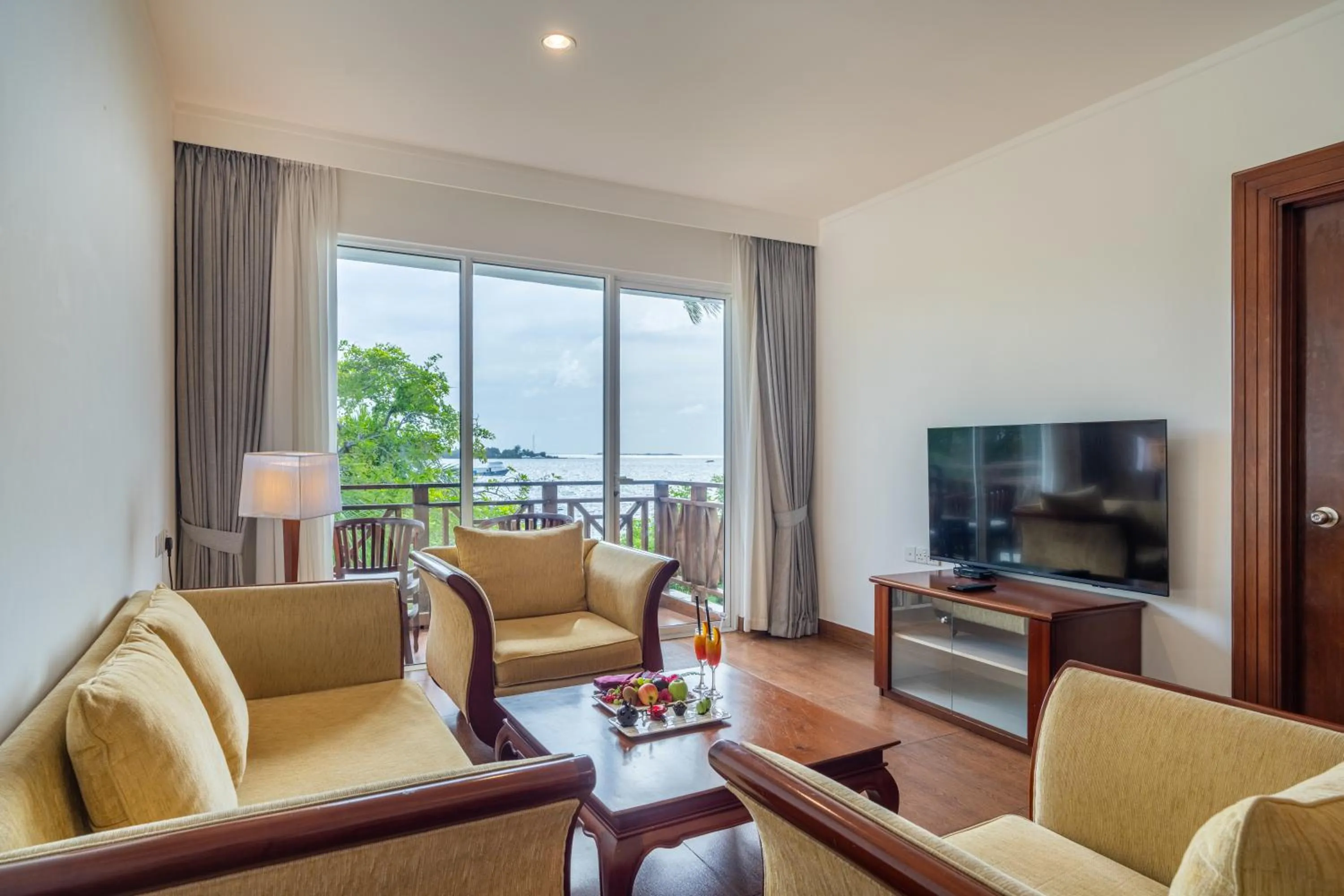 Living room in Hulhule Island Hotel- Private Beach Access & Airport Pick-up and Drop