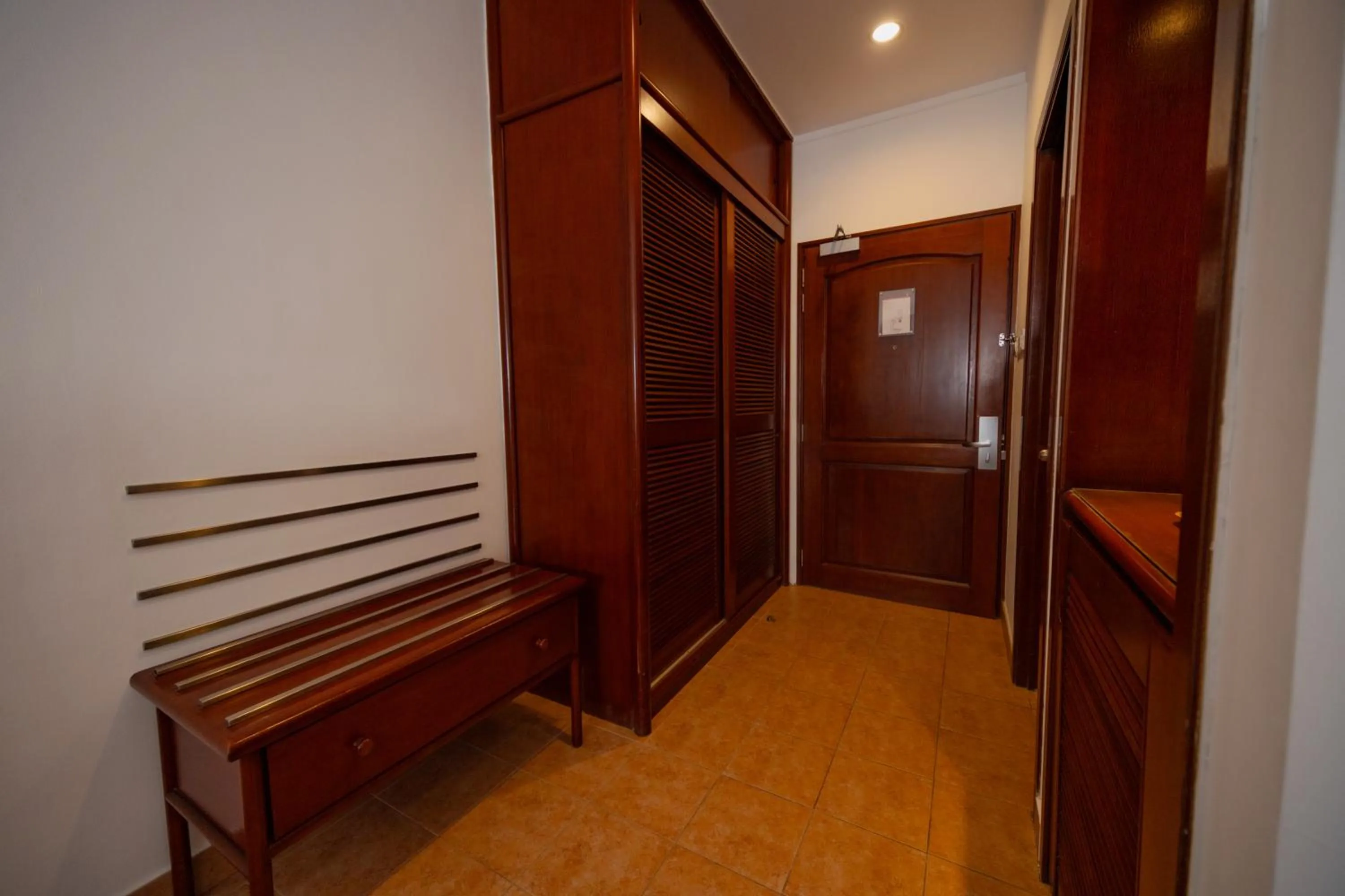 wardrobe in Hulhule Island Hotel- Private Beach Access & Airport Pick-up and Drop