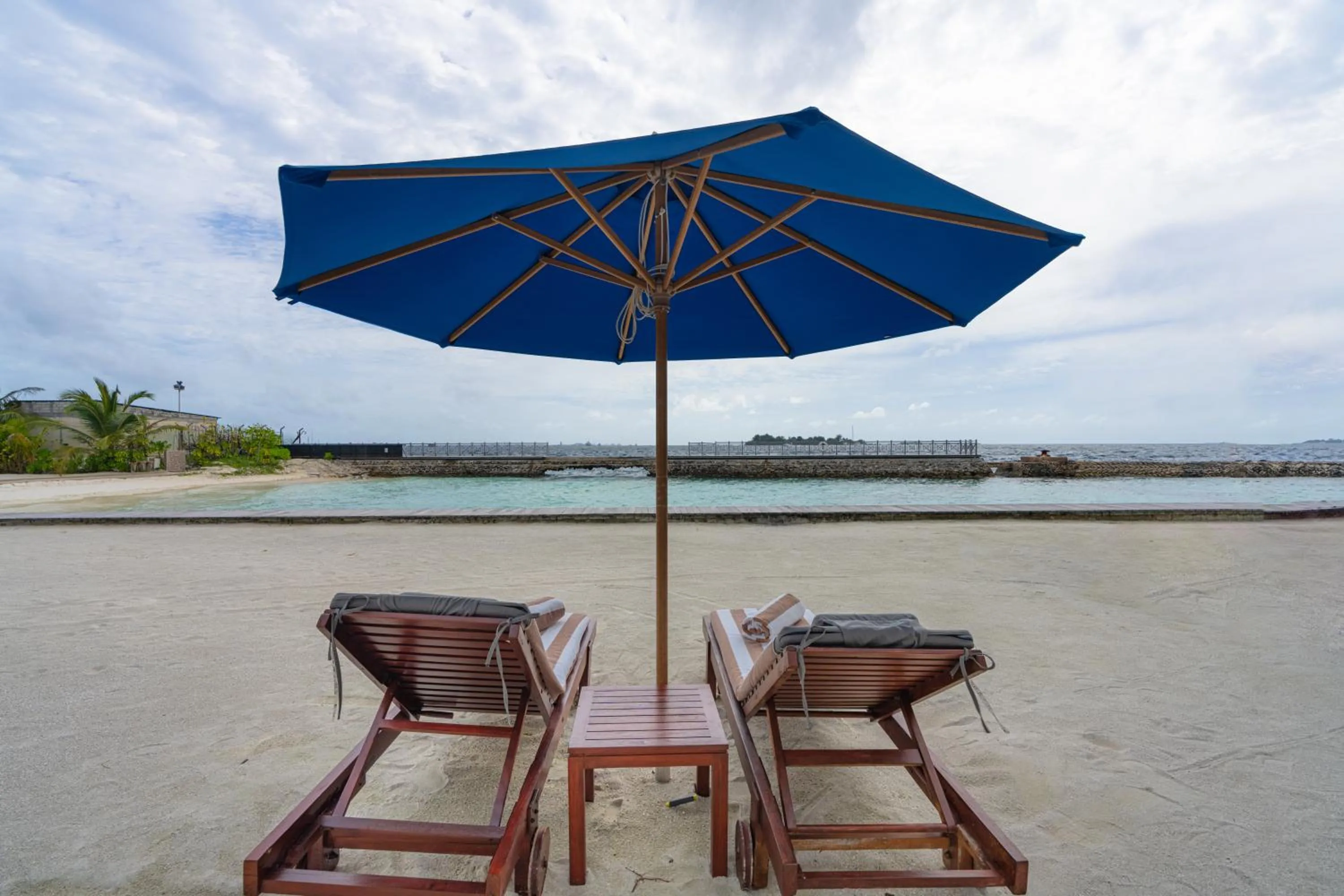 Property building in Hulhule Island Hotel- Private Beach Access & Airport Pick-up and Drop