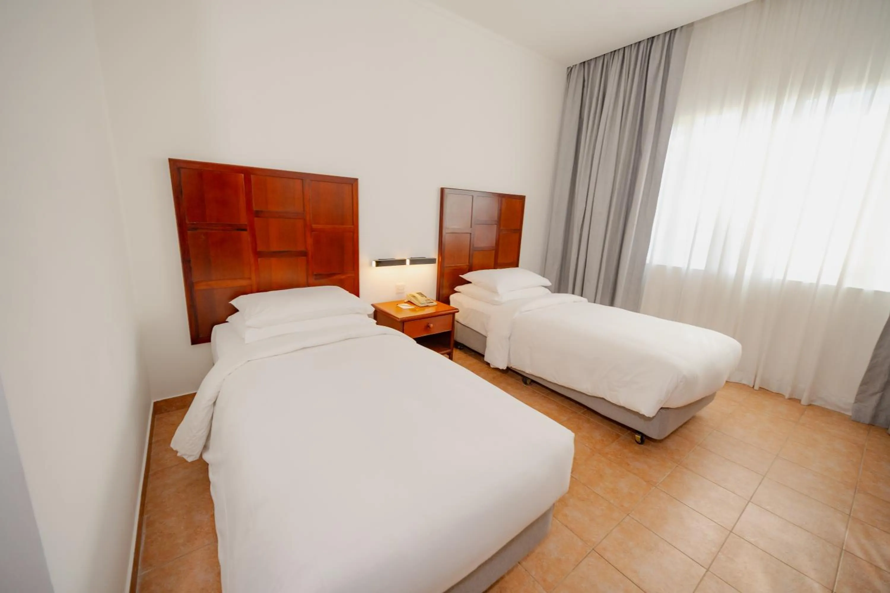 Bed in Hulhule Island Hotel- Private Beach Access & Airport Pick-up and Drop