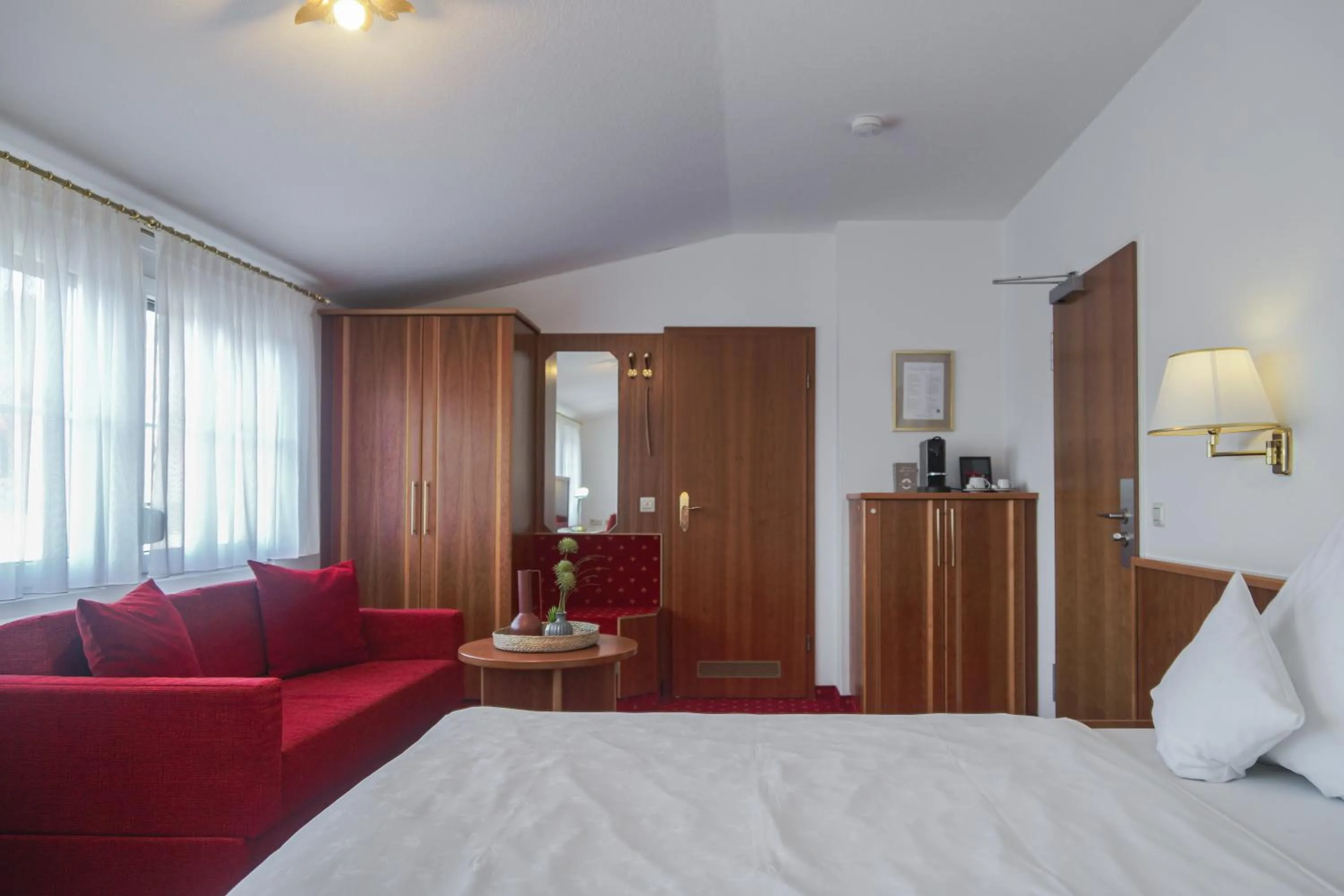 Bed in Hotel Garni in der Breite