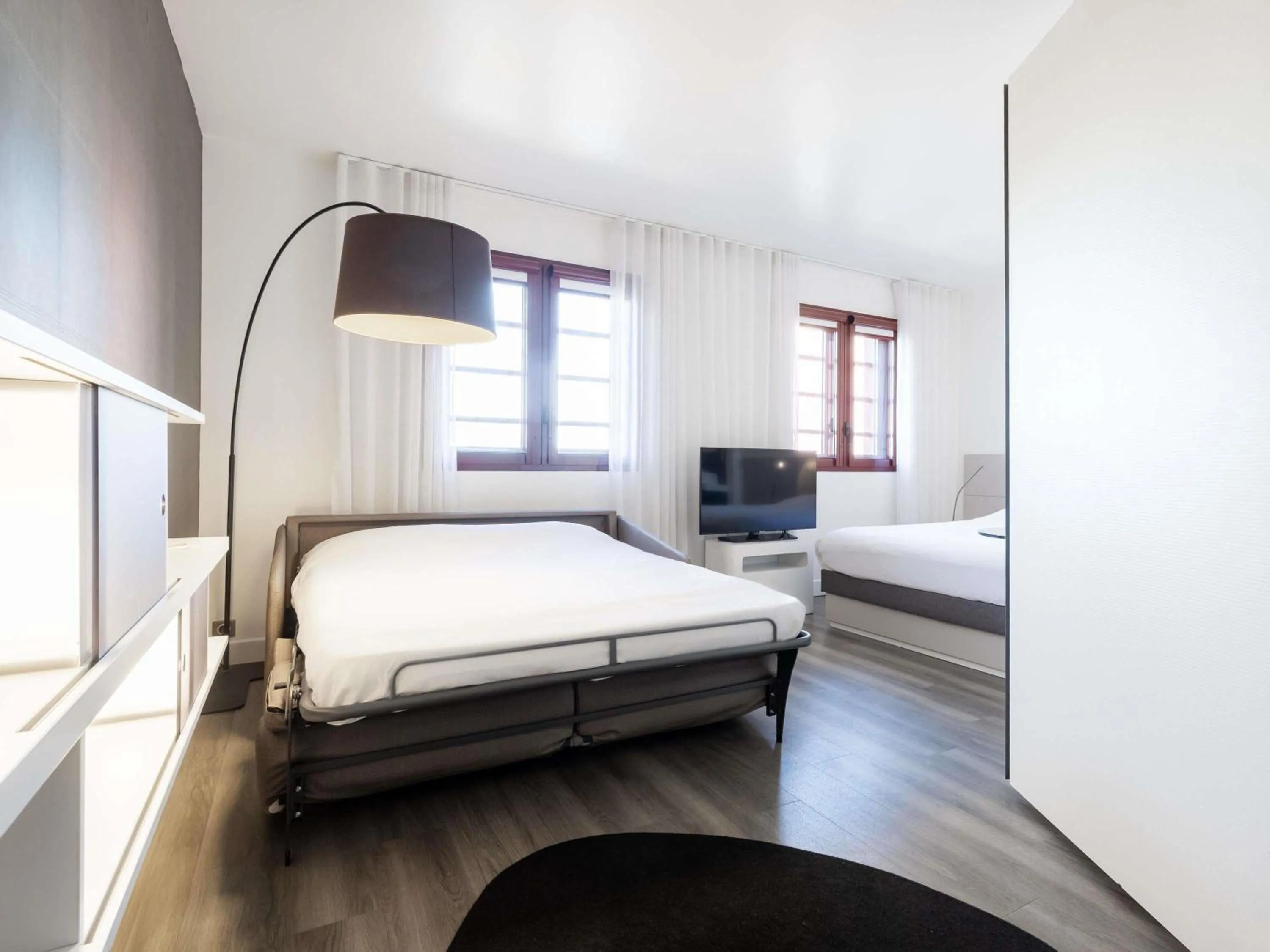 Bedroom, Bed in Novotel Suites Perpignan Centre - Grandes Suites & Confort Centre-Ville