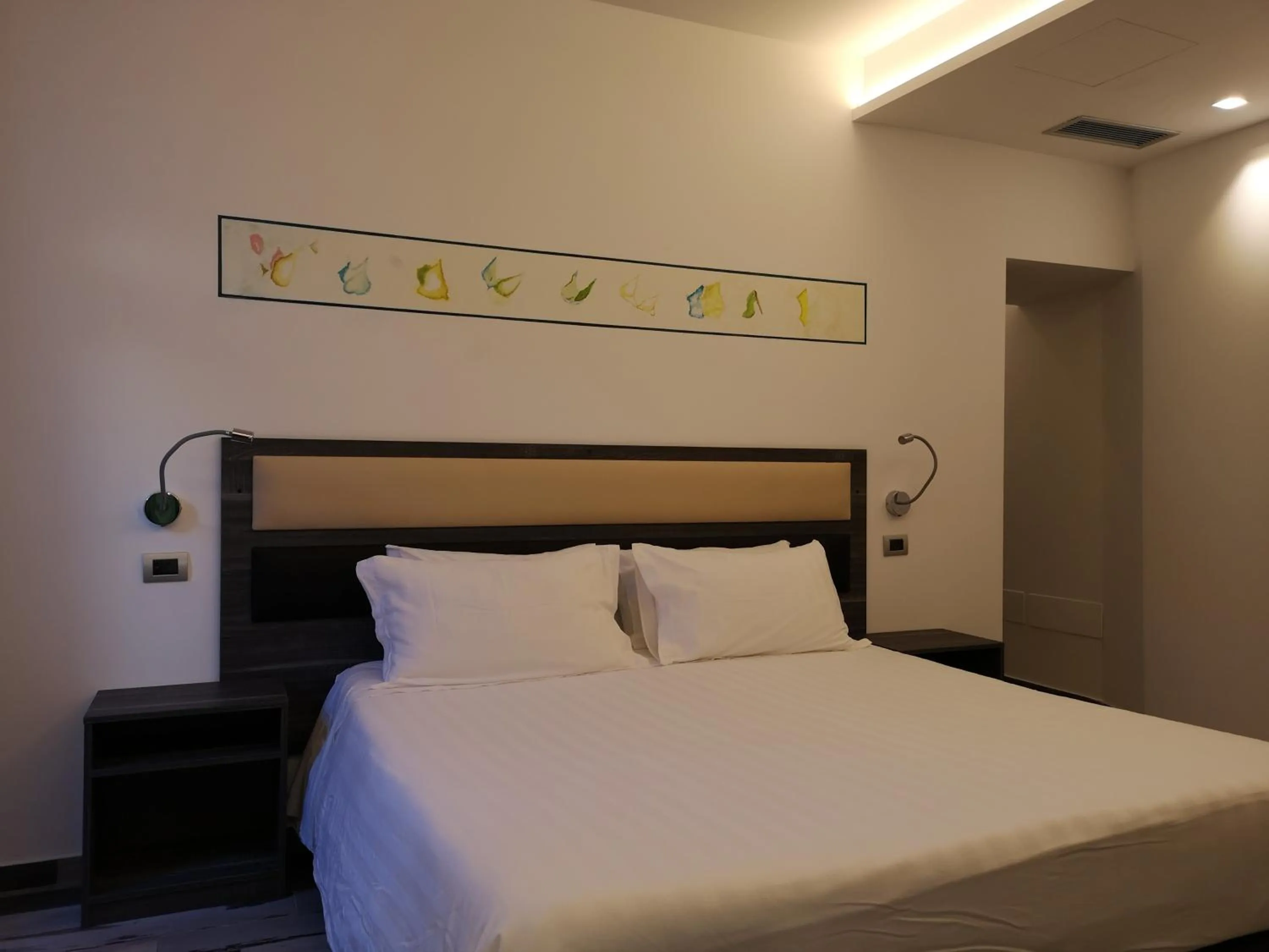 Bed in Palazzo IrMa - Hotel - B&B Luxury