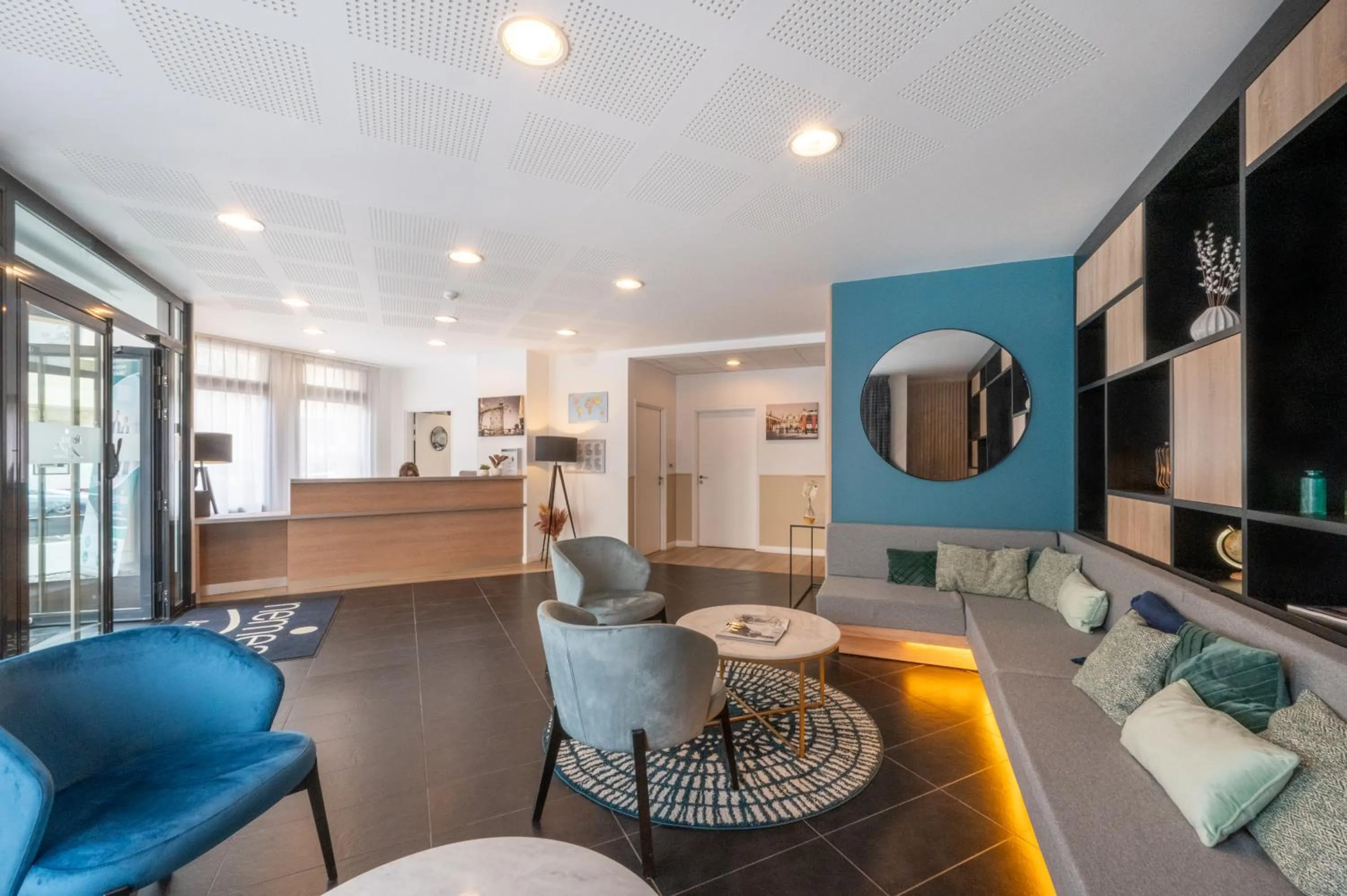 Lobby or reception in Nemea Appart Hotel Home Suite Nancy Centre