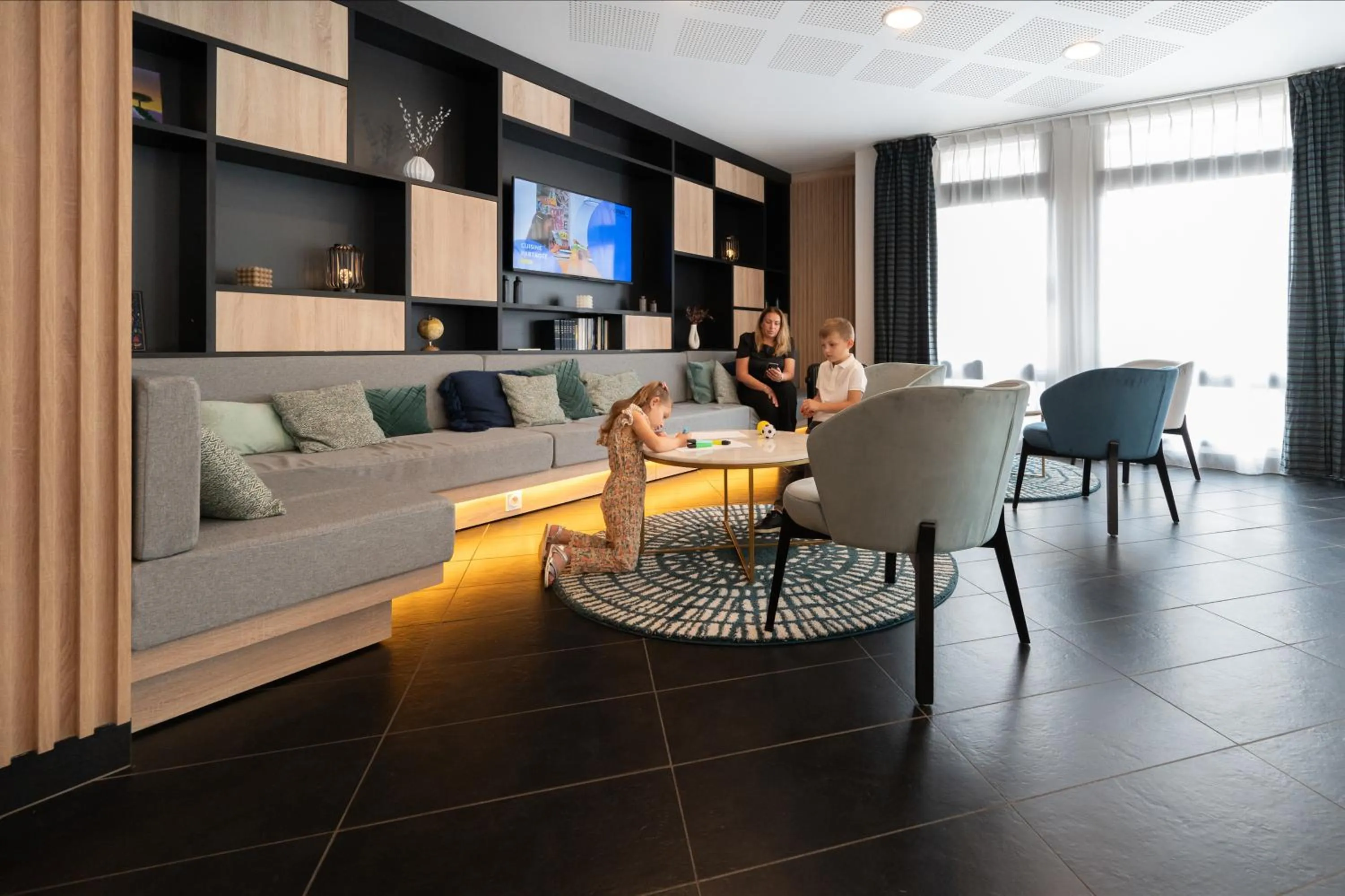 Lobby or reception in Nemea Appart Hotel Home Suite Nancy Centre