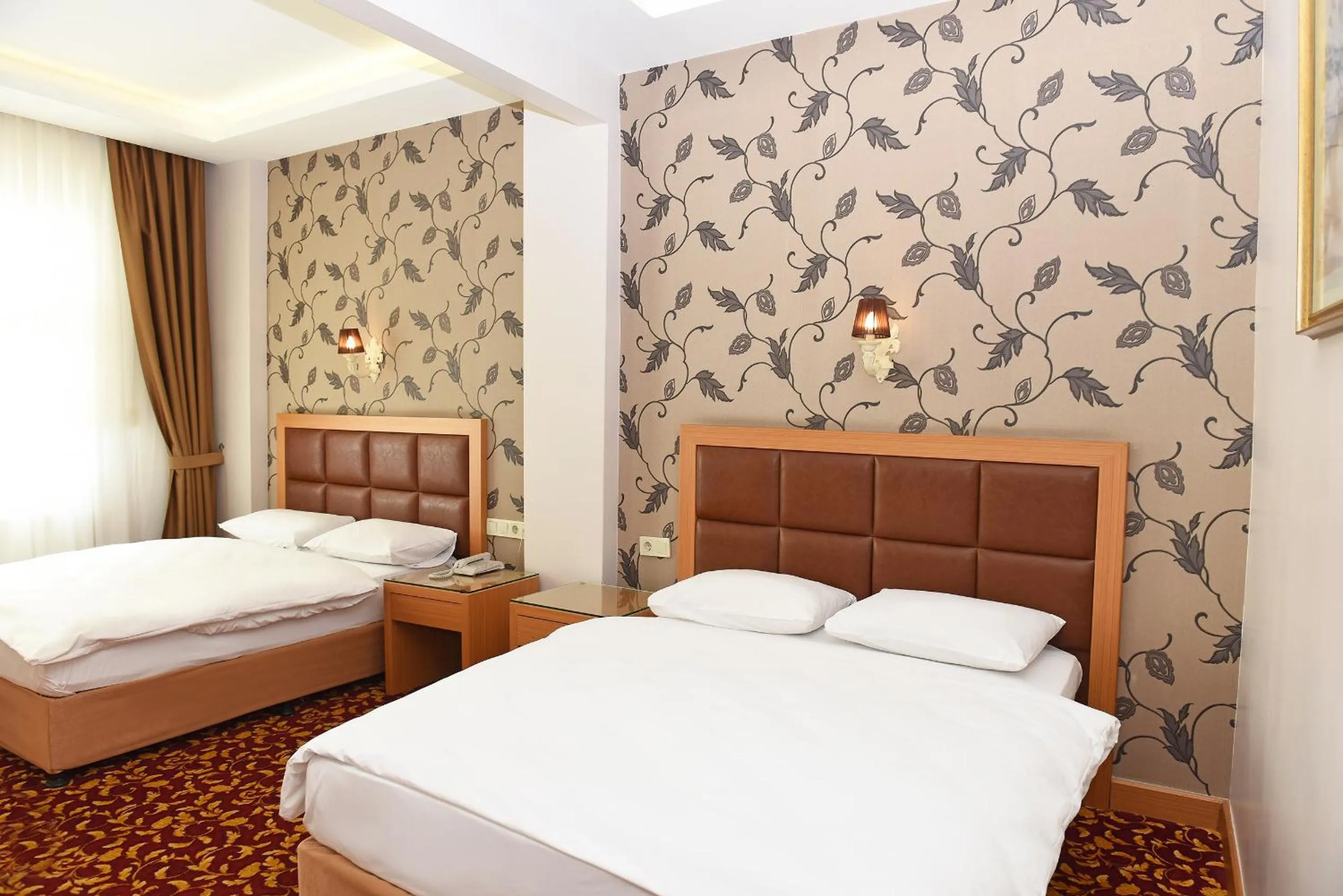 Bed in Hotel Grand Umit