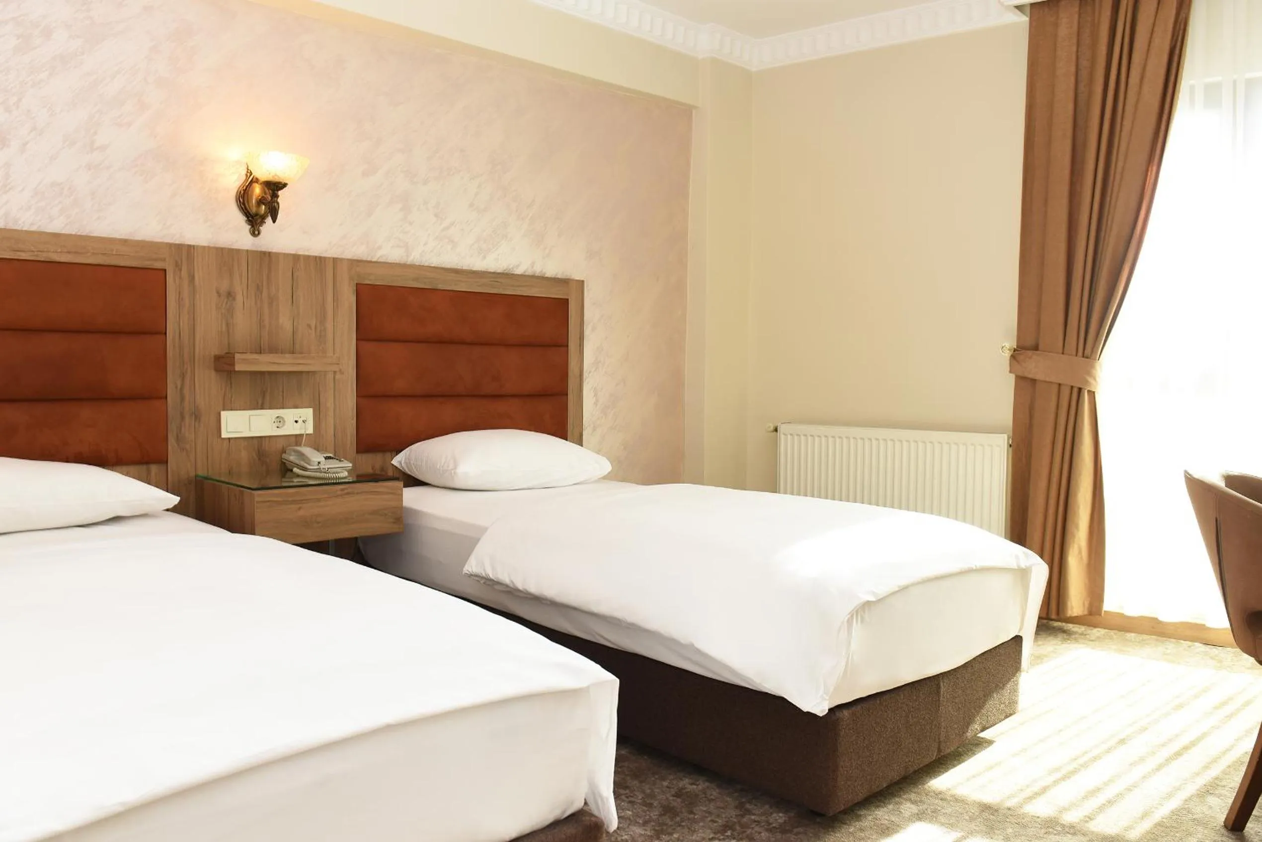 Bed in Hotel Grand Umit