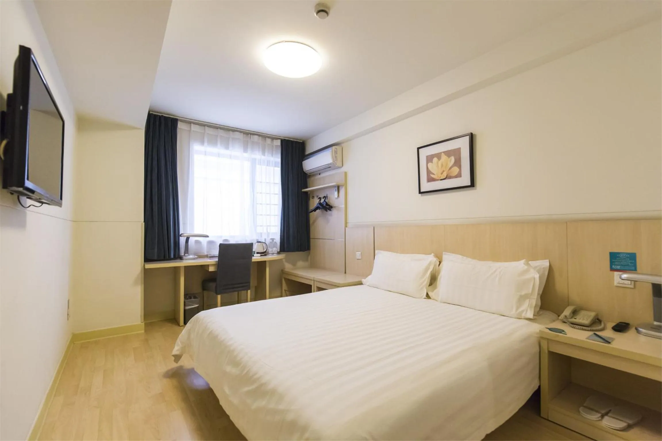 Bedroom in Jinjiang Inn - Huaian Wanda Plaza East Jiankang Road