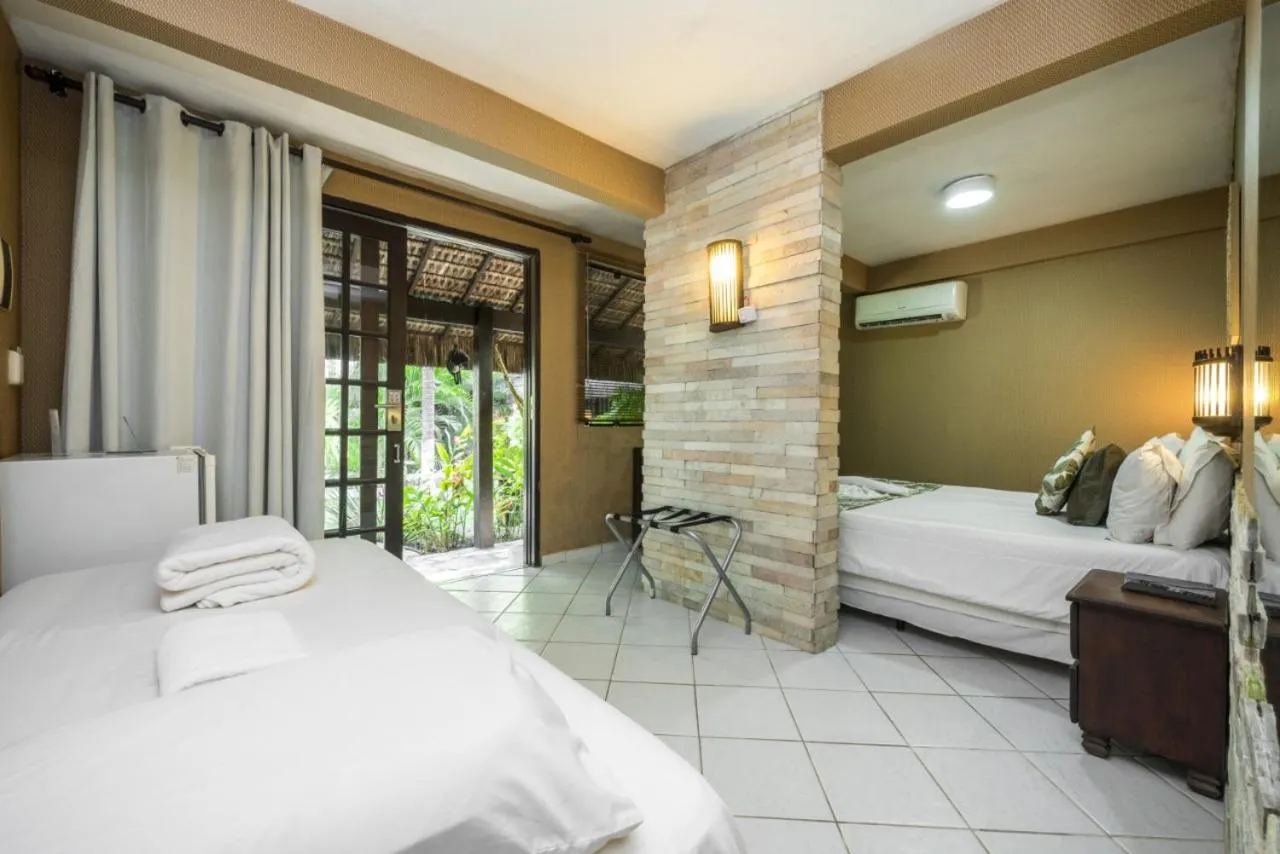 Bed in Pousada Recanto da Coruja