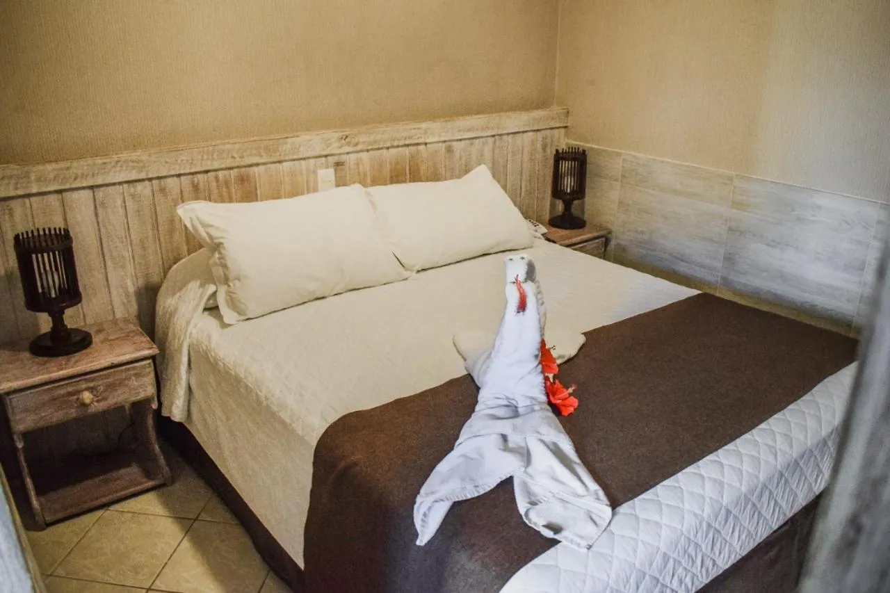 Bed in Pousada Recanto do Lobo