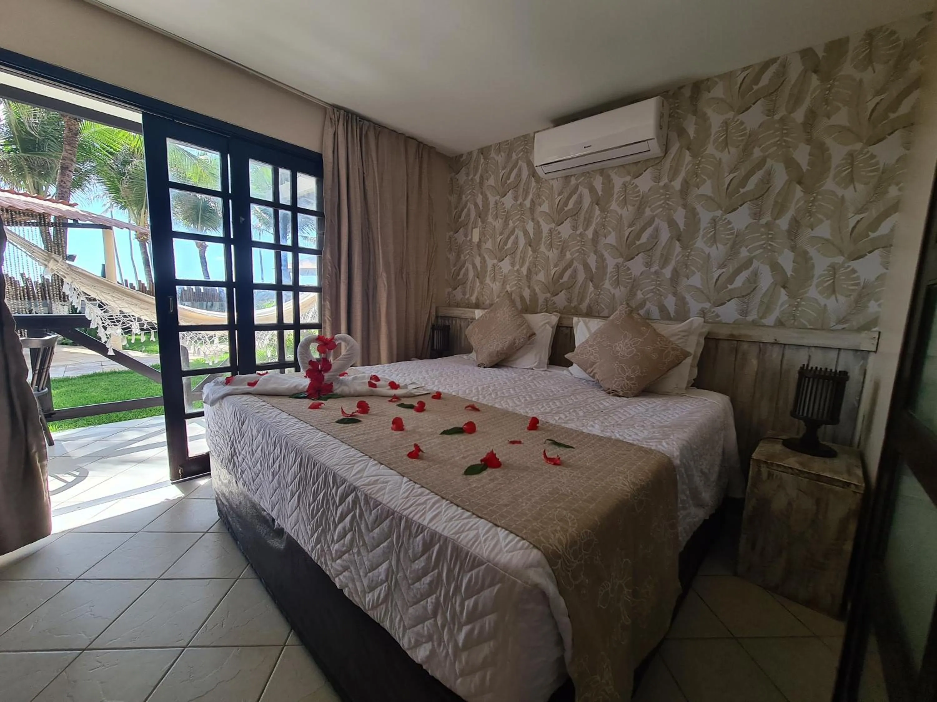 Bed in Pousada Recanto do Lobo