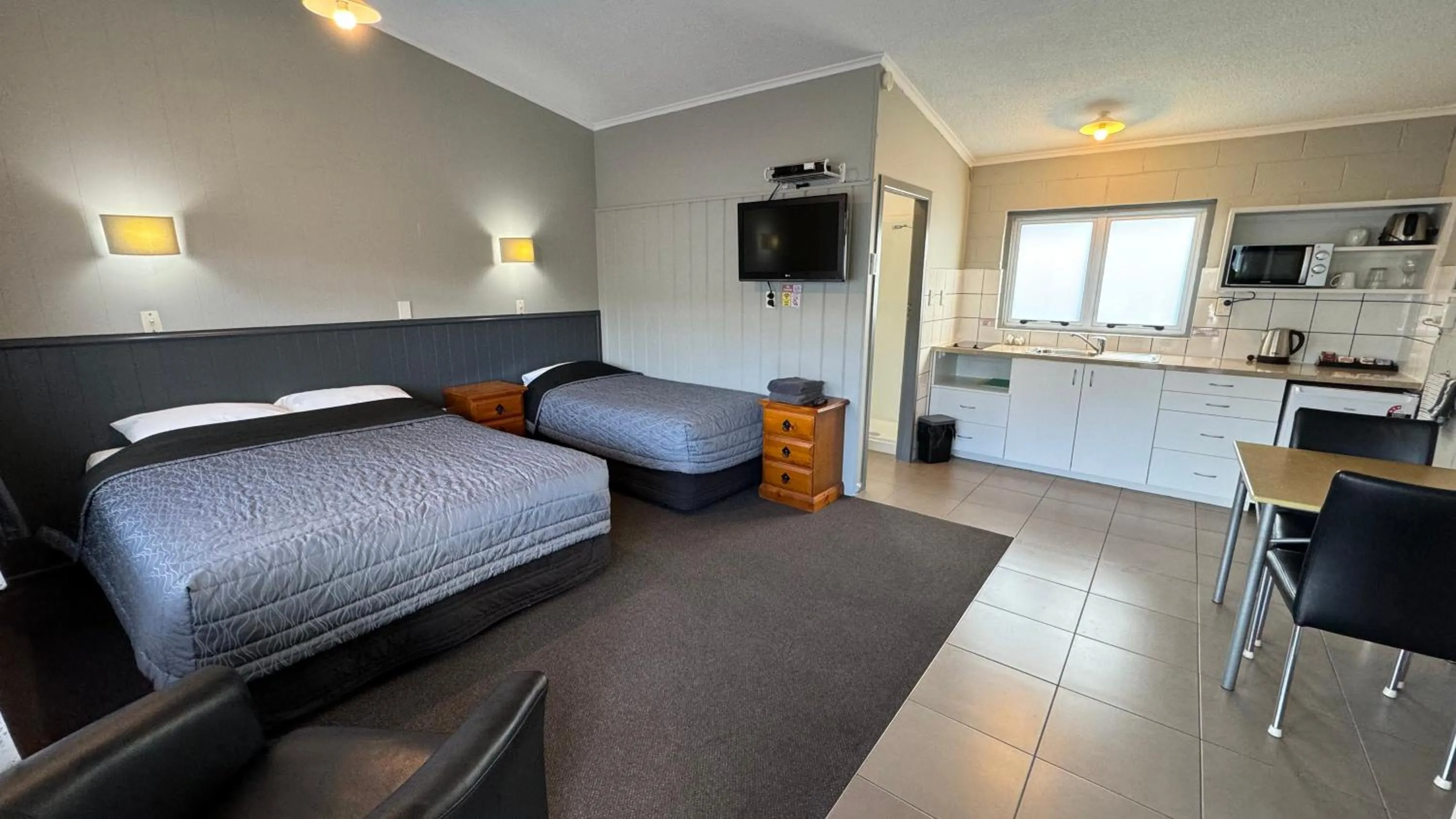 Bed in Central Court Motel