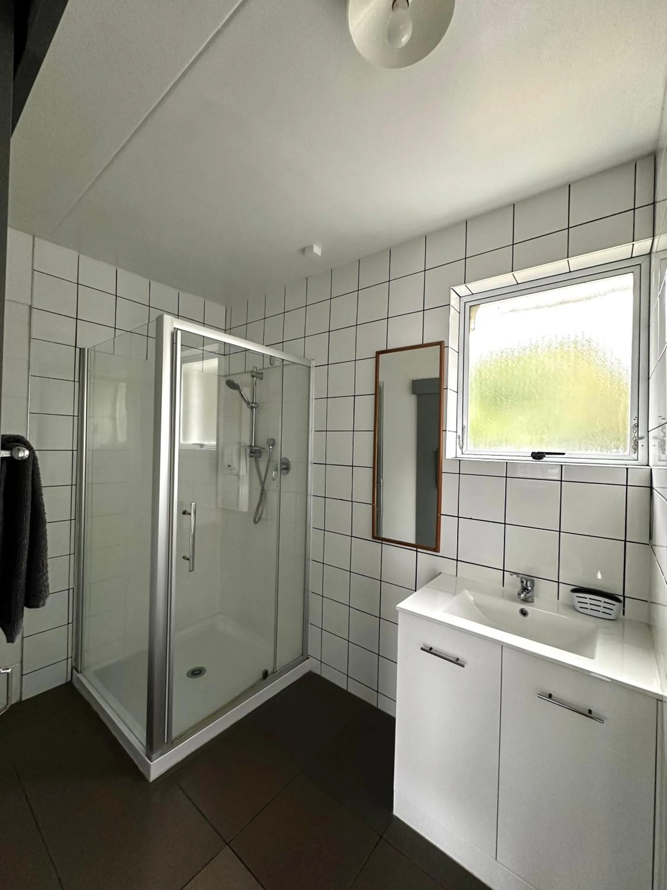 Shower in Central Court Motel