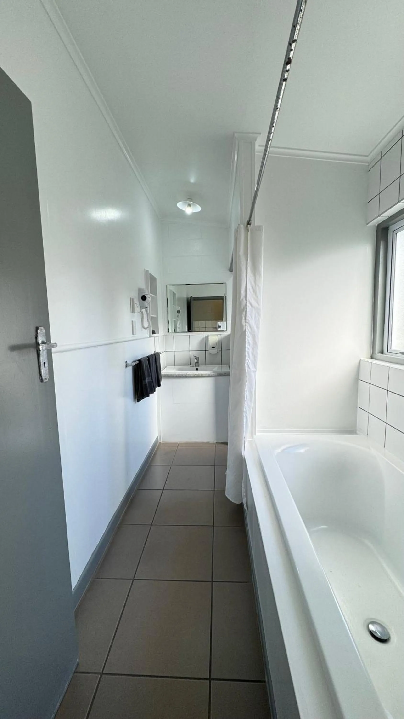 Bathroom in Central Court Motel