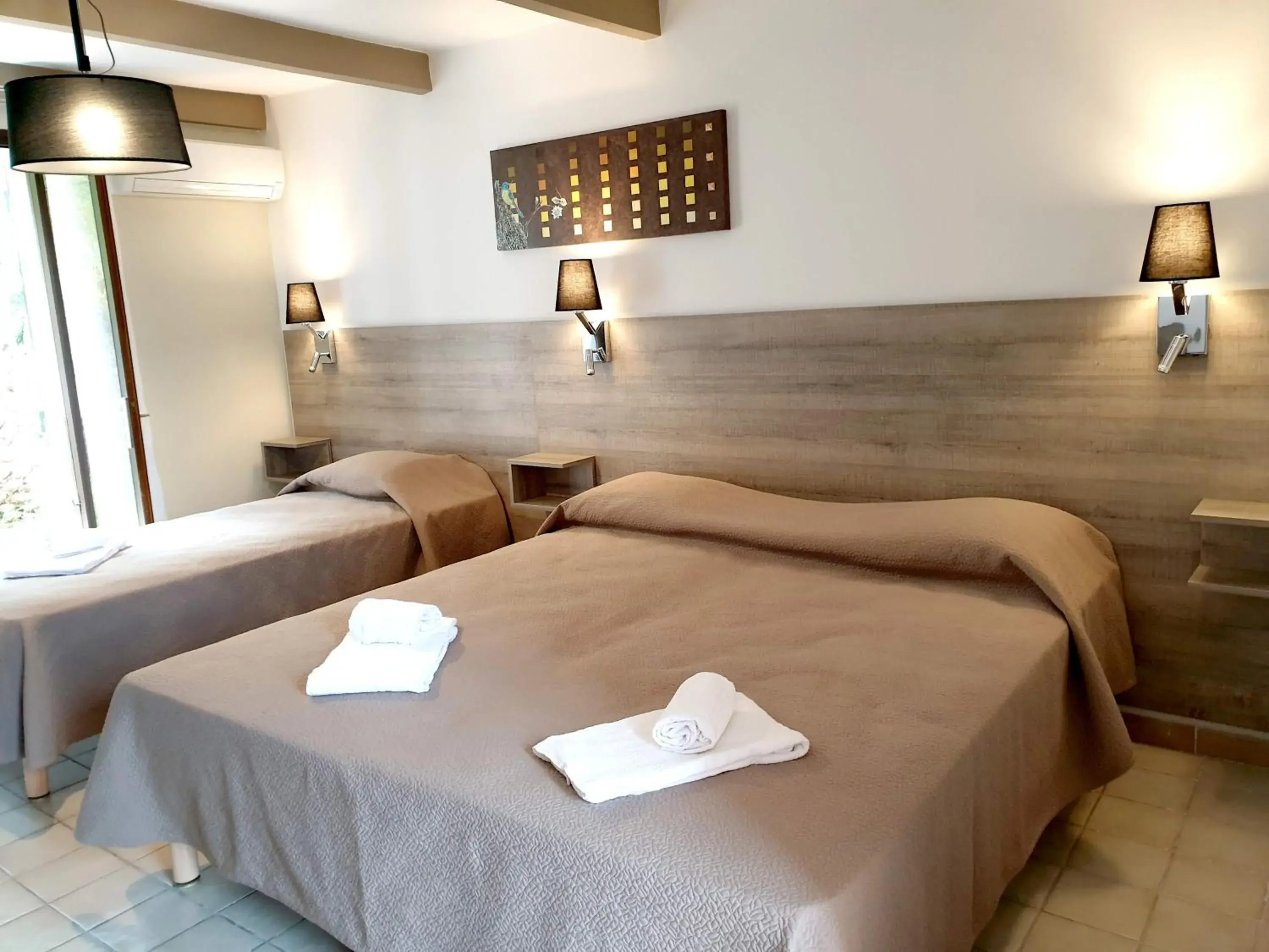 Triple Room in Hotel Olmuccio Triple Room in Hotel Olmuccio