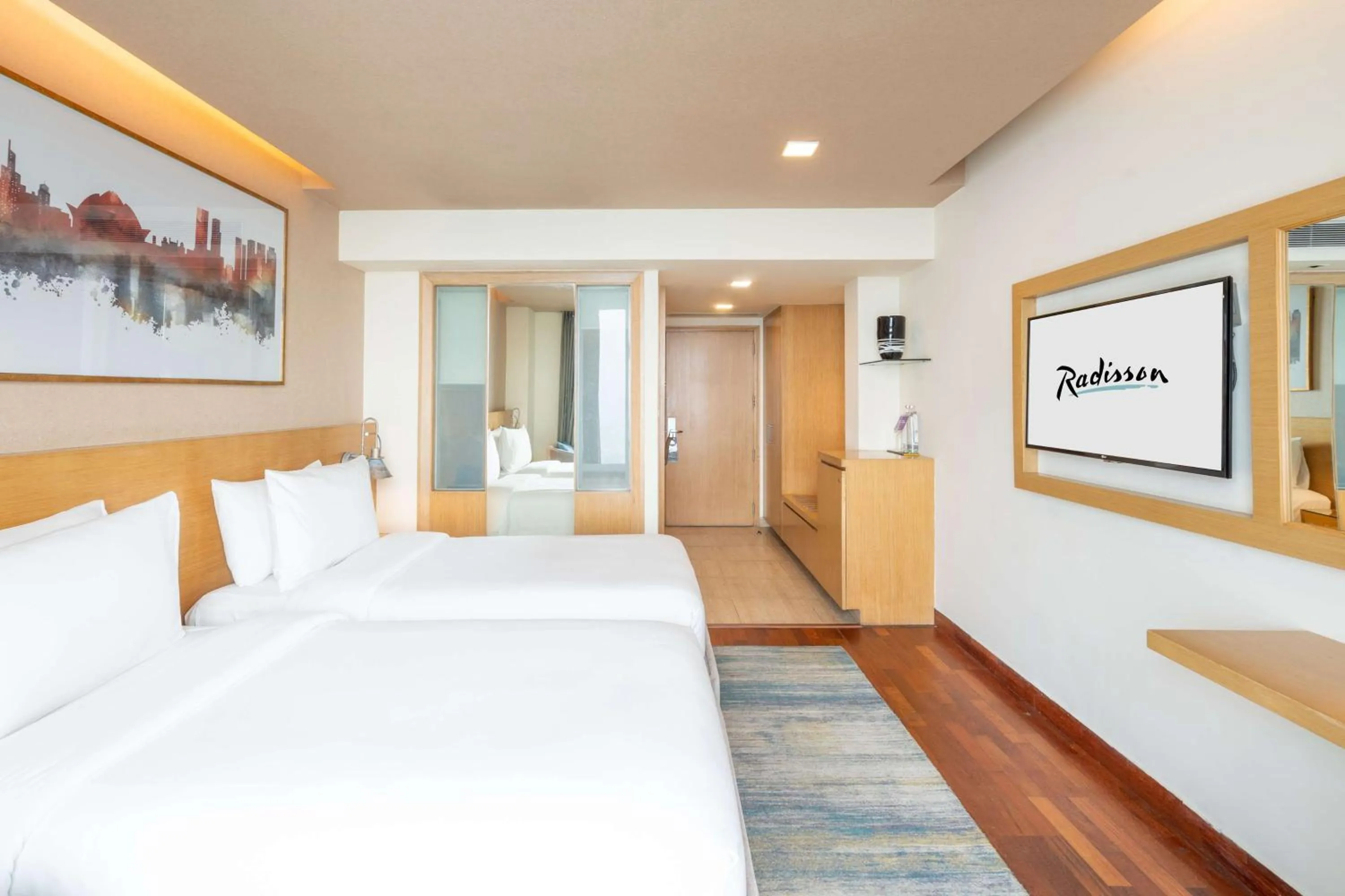 Bedroom, Bed in Radisson Gurugram Sohna Road City Center