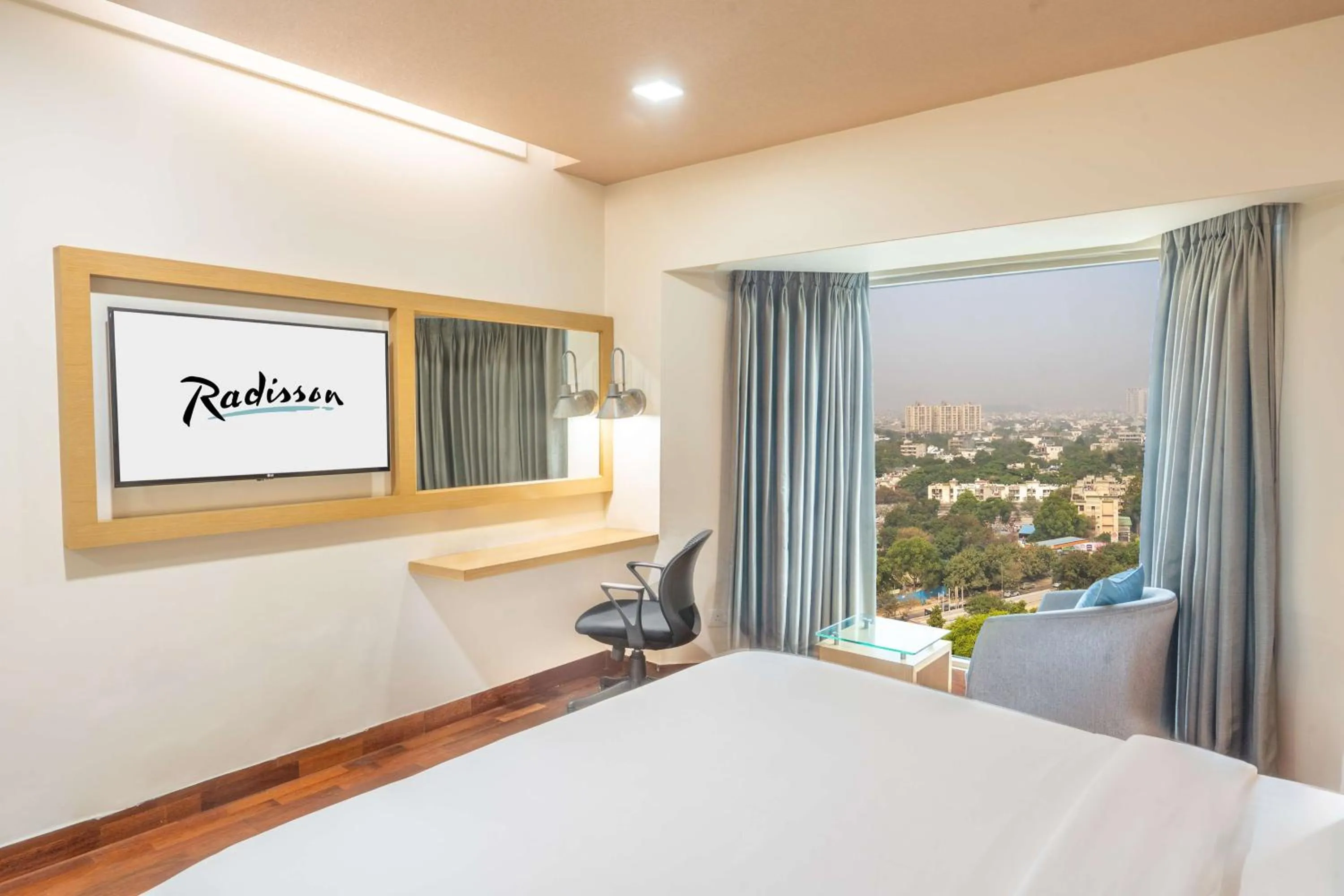 Bedroom, Bed in Radisson Gurugram Sohna Road City Center