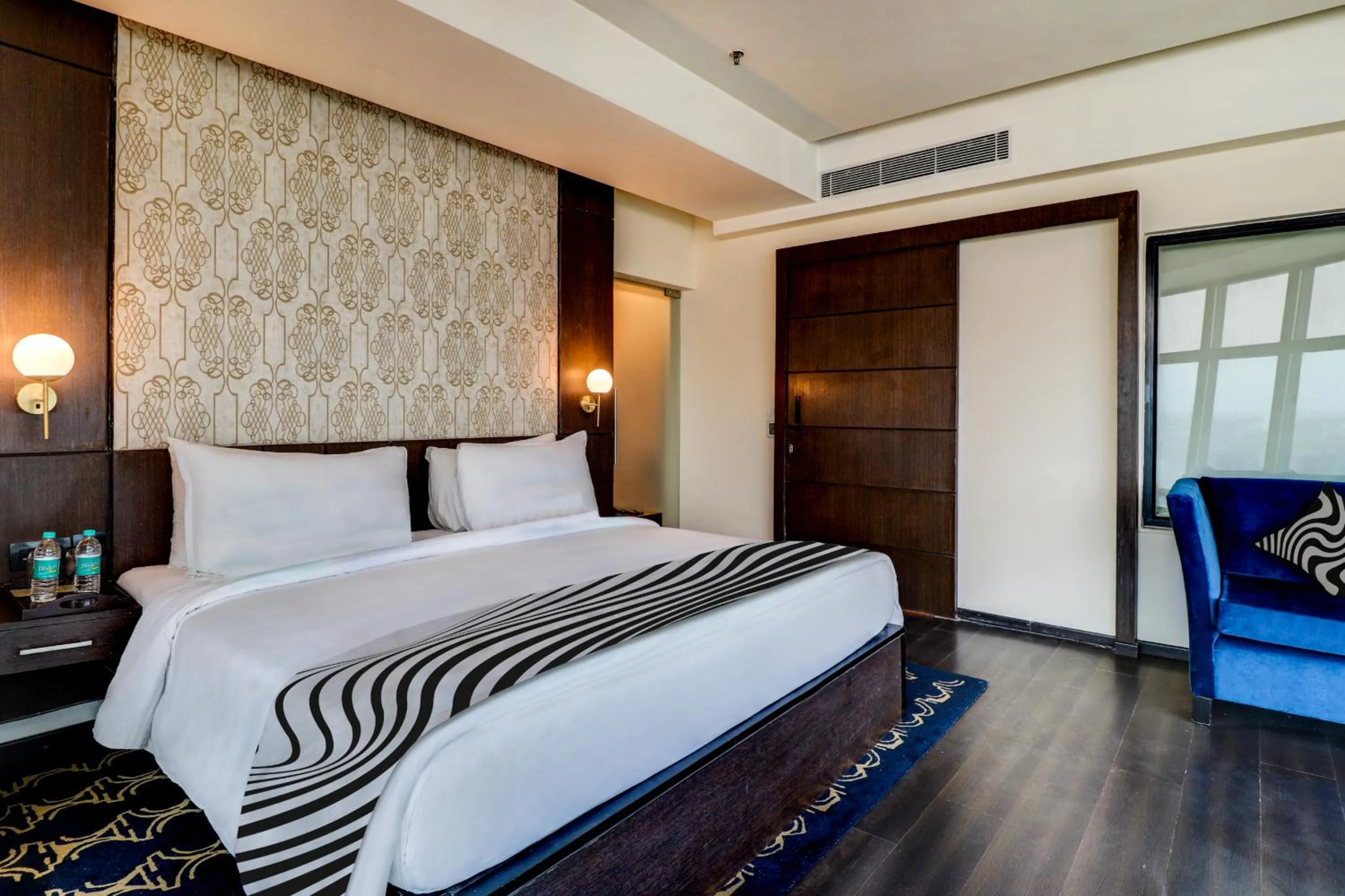 Bed in Sunday Hotel by CheckIn Jaipur