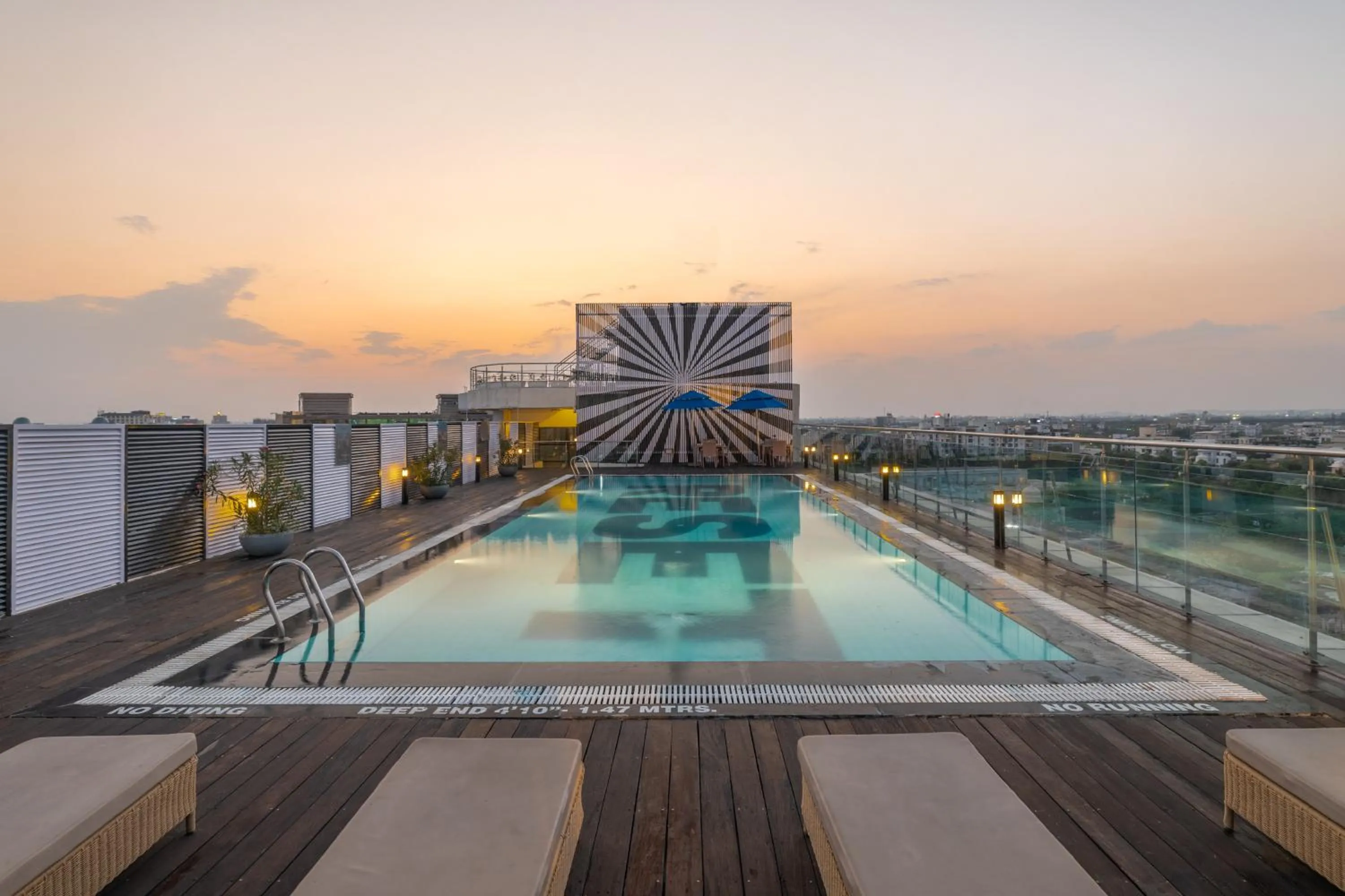 Swimming pool in Sunday Hotel by CheckIn Jaipur