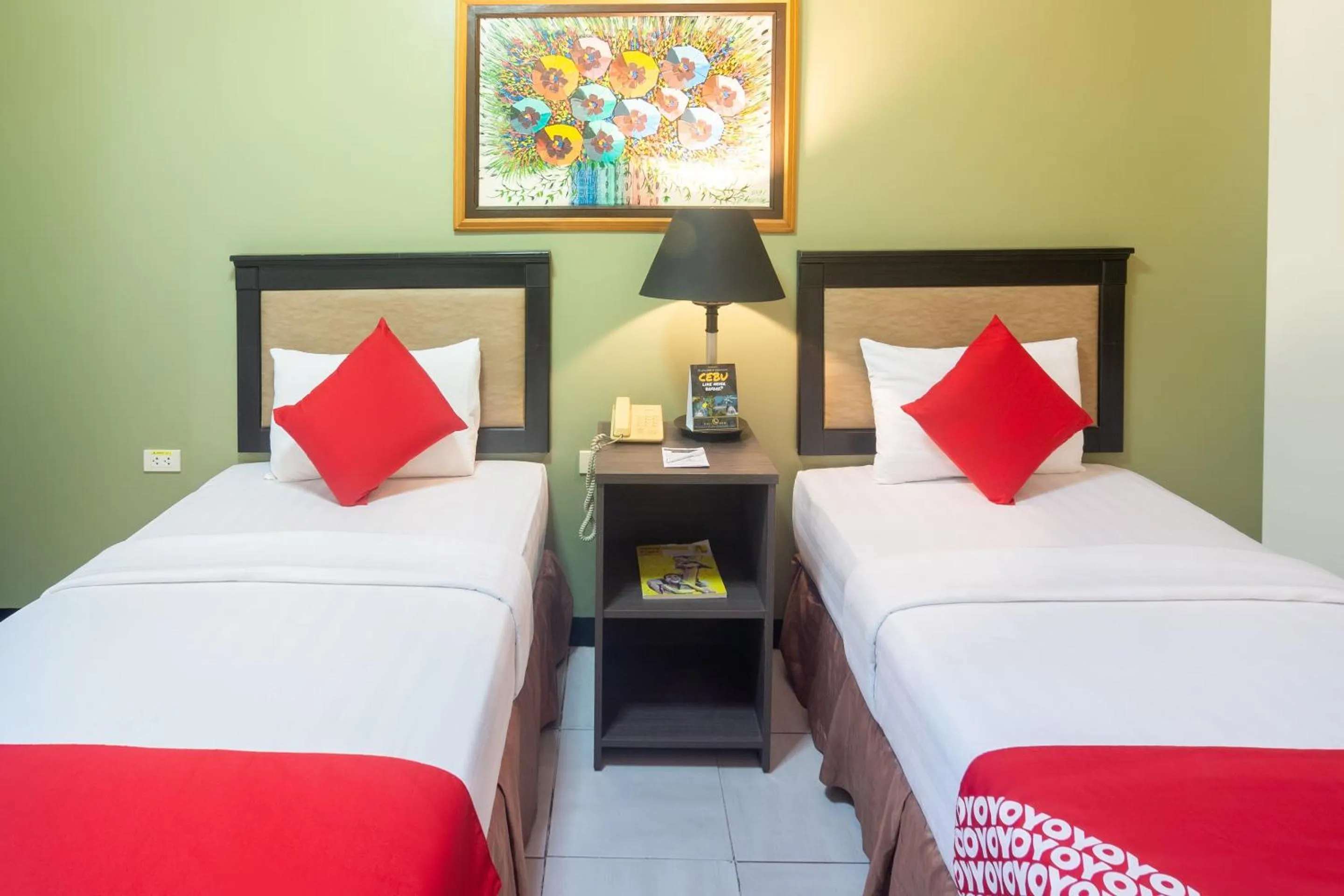 Bedroom in OYO 187 The Maxwell Hotel