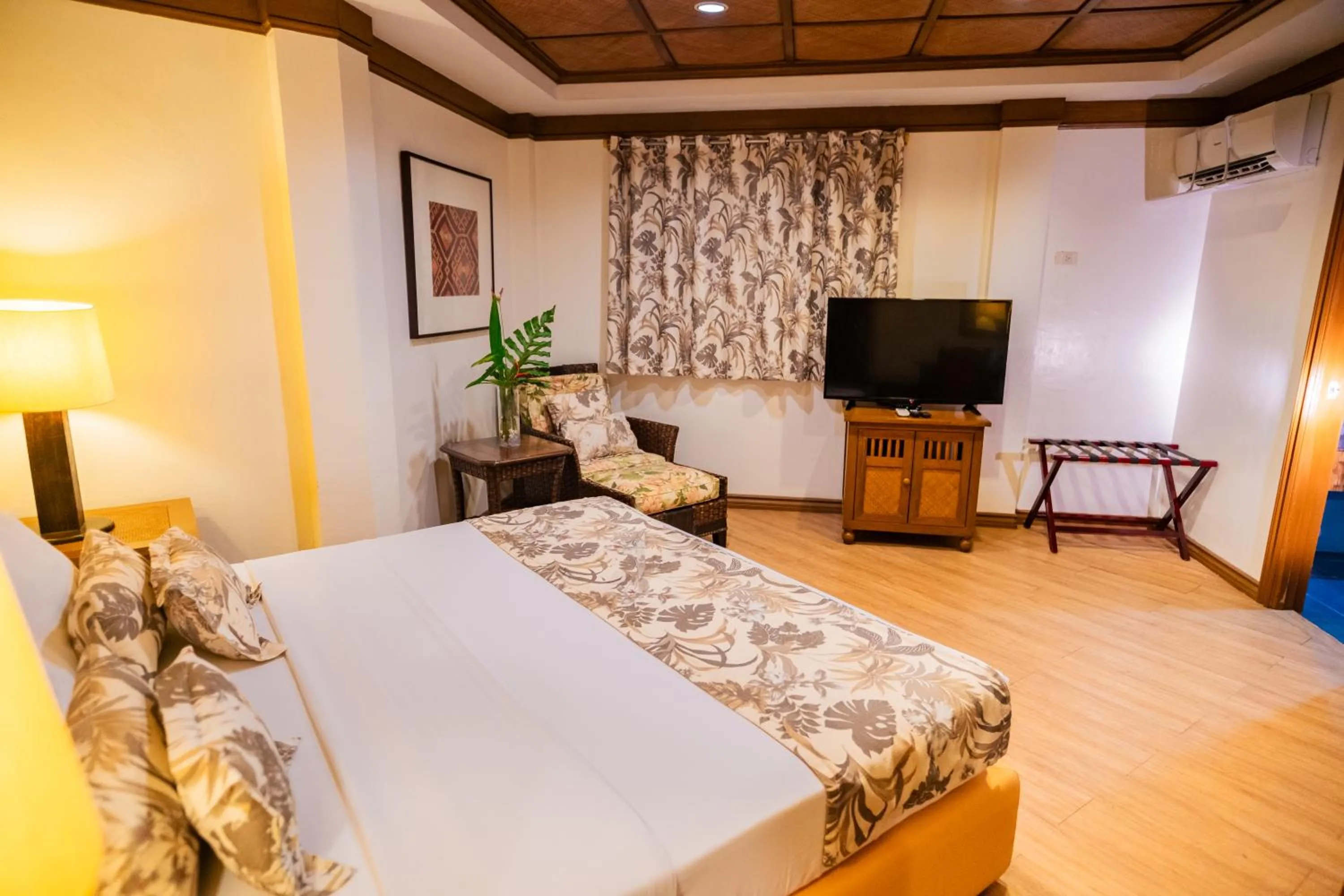 Bed in Boracay Tropics Resort Hotel